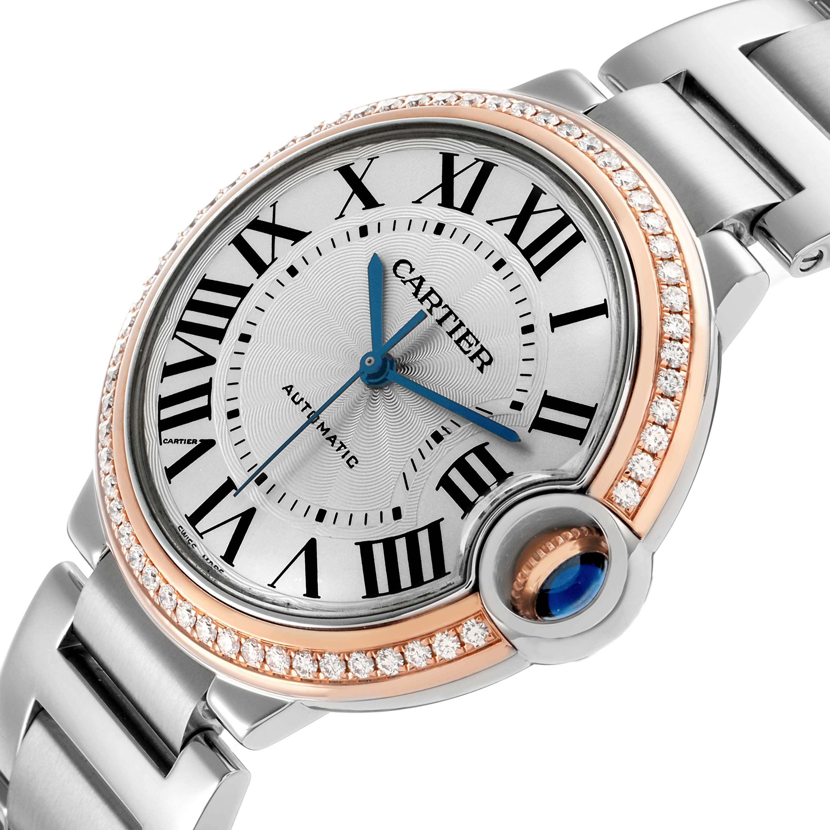 The Cartier Ballon Bleu WE902081 Women's Steel and Gold (two tone) Silver Dial watch is shown from a side angle, highlighting its Roman numeral dial, diamond-set bezel, and steel bracelet.