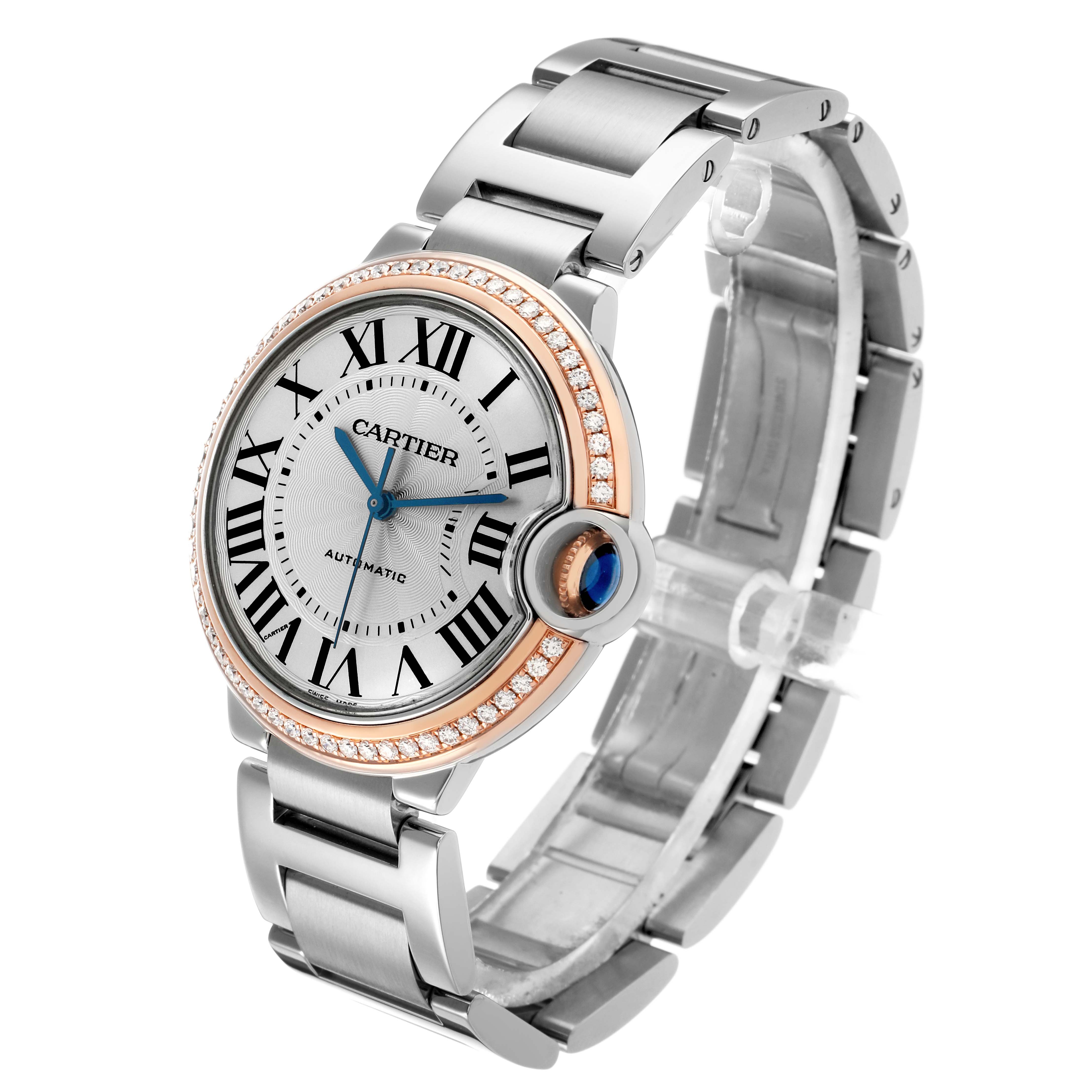 The Cartier Ballon Bleu WE902081 Women's Steel and Gold (two tone) Silver Dial watch is shown at a three-quarter angle, highlighting its face, bracelet, and crown.