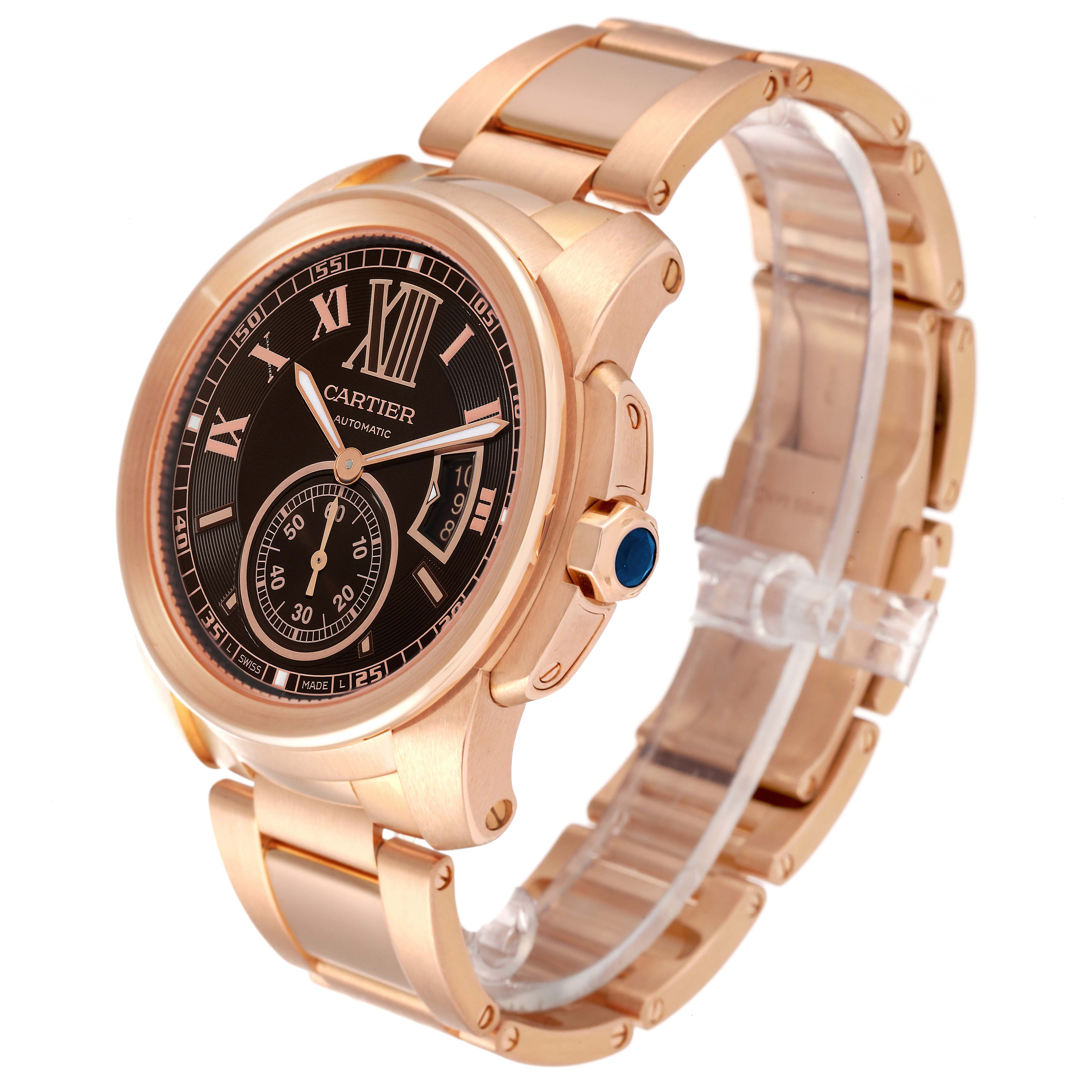 The Calibre de Cartier watch by Cartier is shown at a three-quarter angle, highlighting the face, bezel, crown, and bracelet.