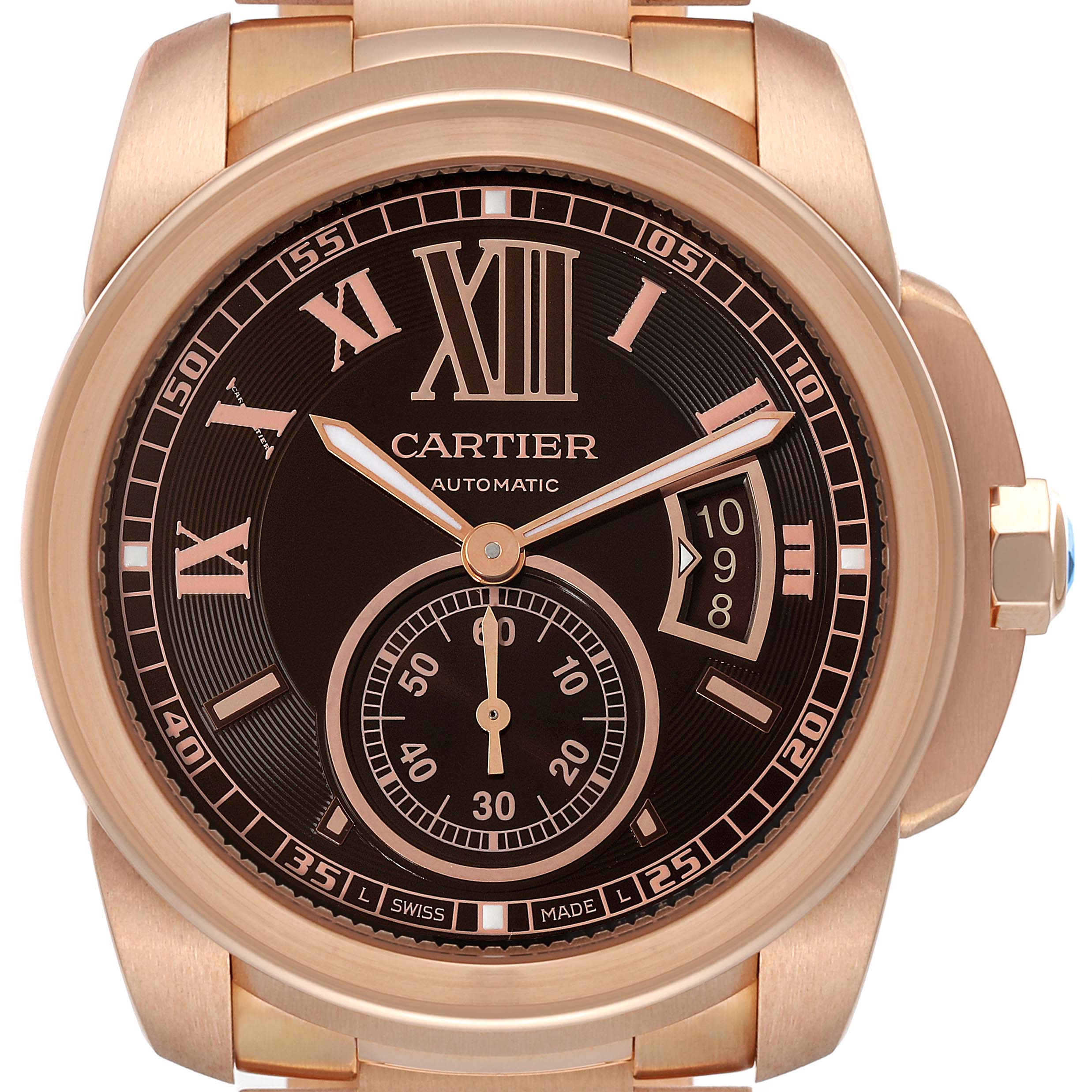 This image shows a front view of the Calibre de Cartier watch by Cartier, displaying its dial and case.