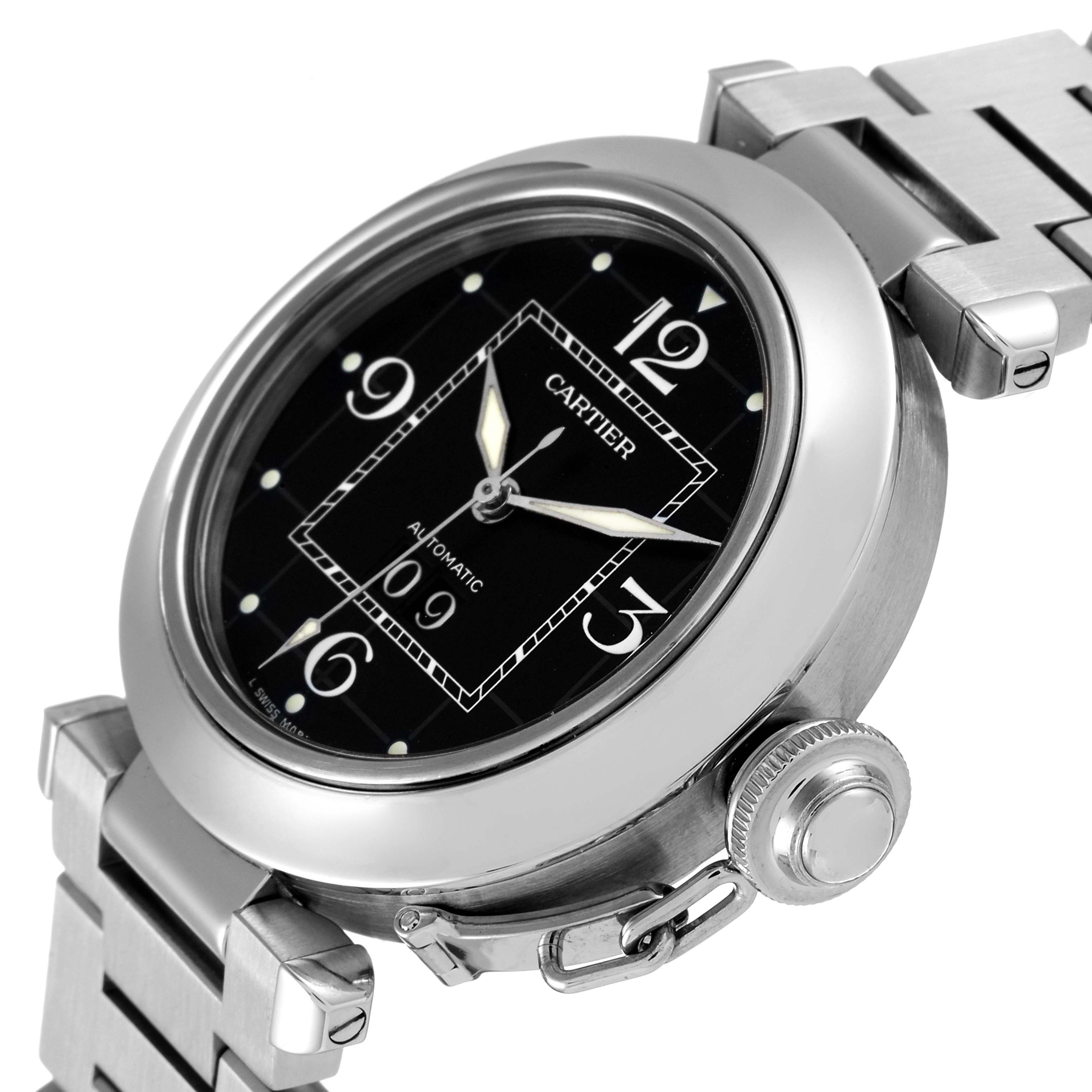 The image shows a close-up, angled view of the Cartier Pasha W31053M7 Women's Stainless Steel Black Dial W31053M7 Women's Stainless Steel Black Dial watch, highlighting its dial, bezel, crown, and bracelet.