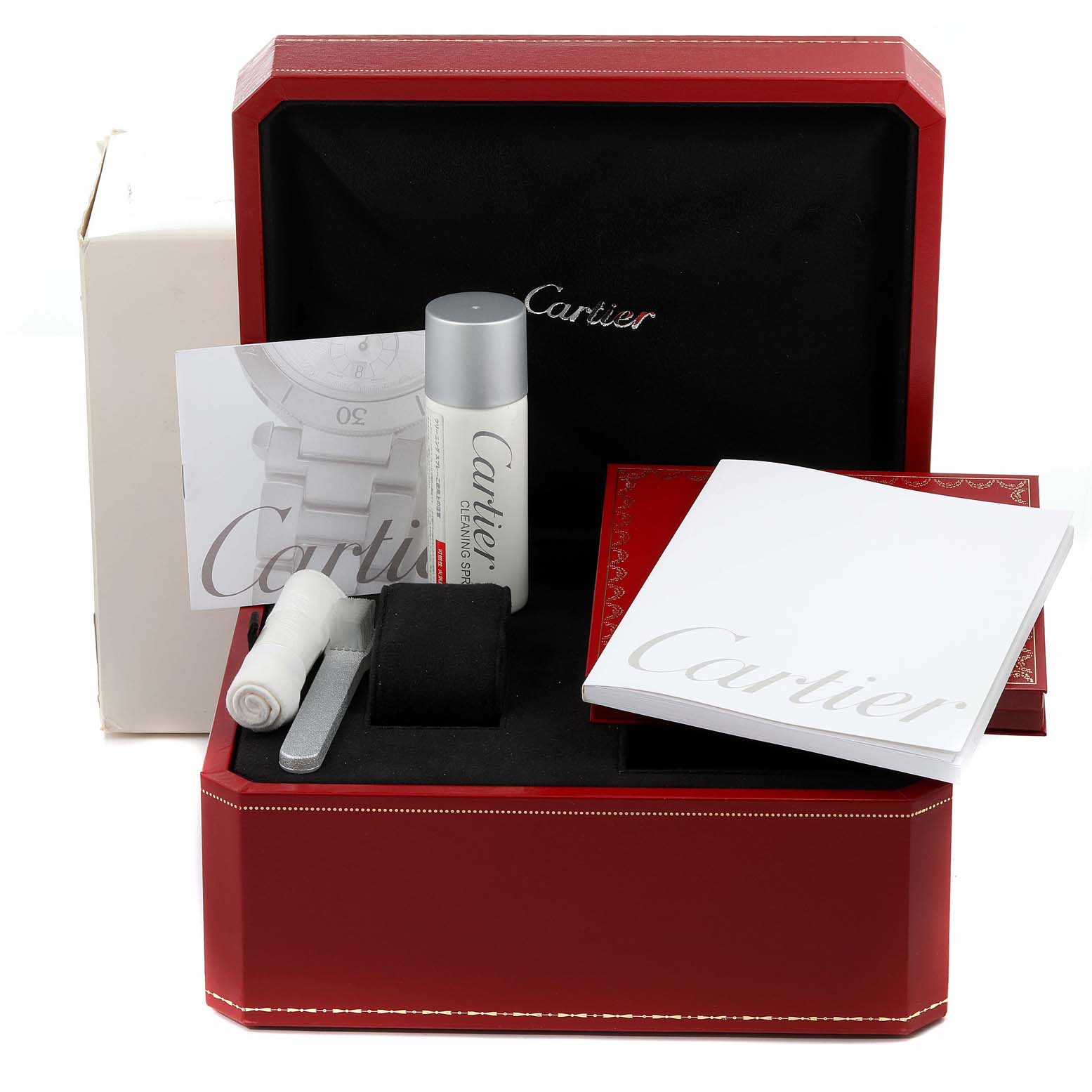 The image shows the Cartier Roadster W62025V3 Men
s Stainless Steel Silver Dial W62025V3 Men
s Stainless Steel Silver Dial watch box and accessories, including cleaning supplies, a booklet, and a polishing cloth.