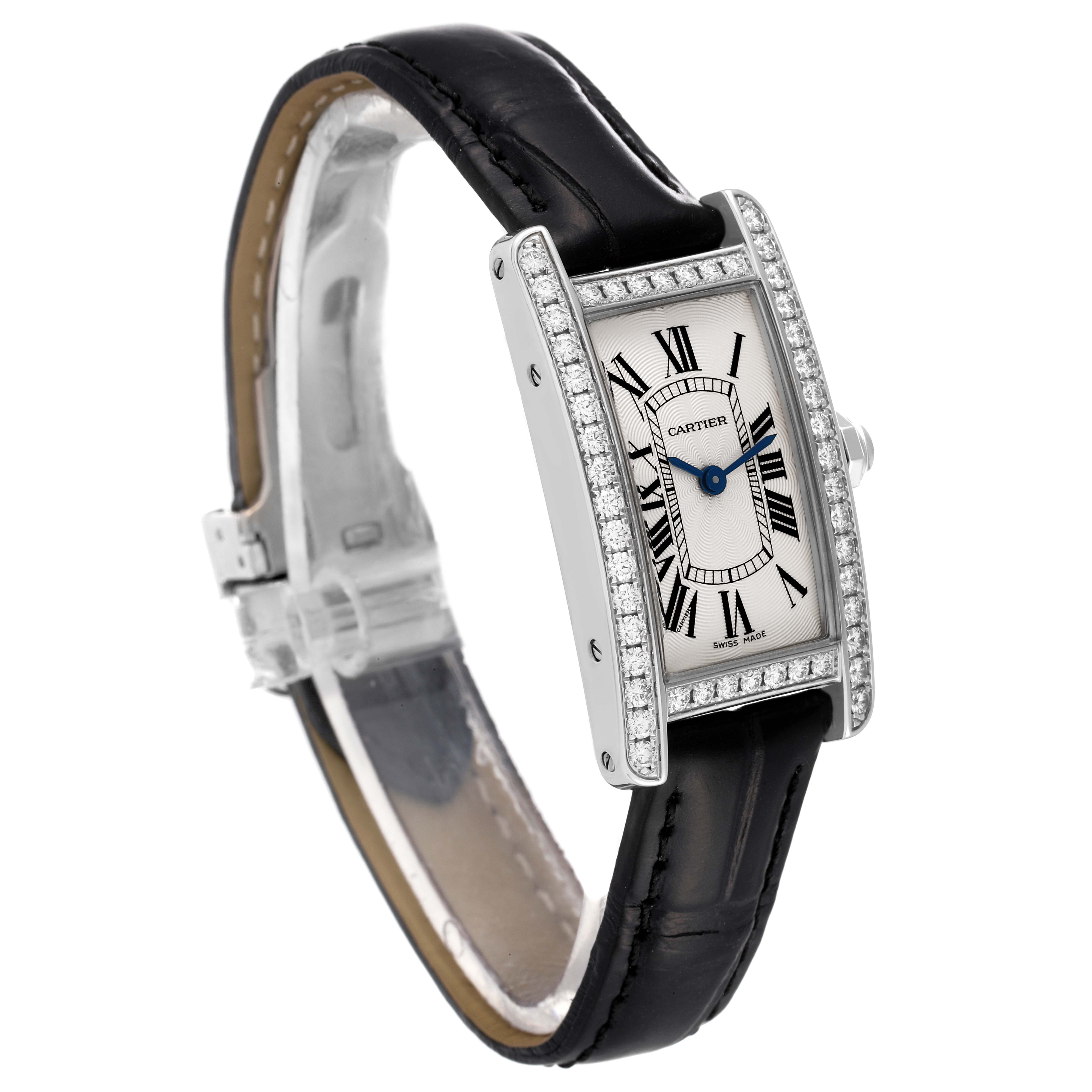 This image shows a Cartier Tank Americaine 2489 Women's White Gold Silver Dial 2489 Women's White Gold Silver Dial watch at a three-quarter angle, highlighting the face, bezel with diamonds, and leather strap.