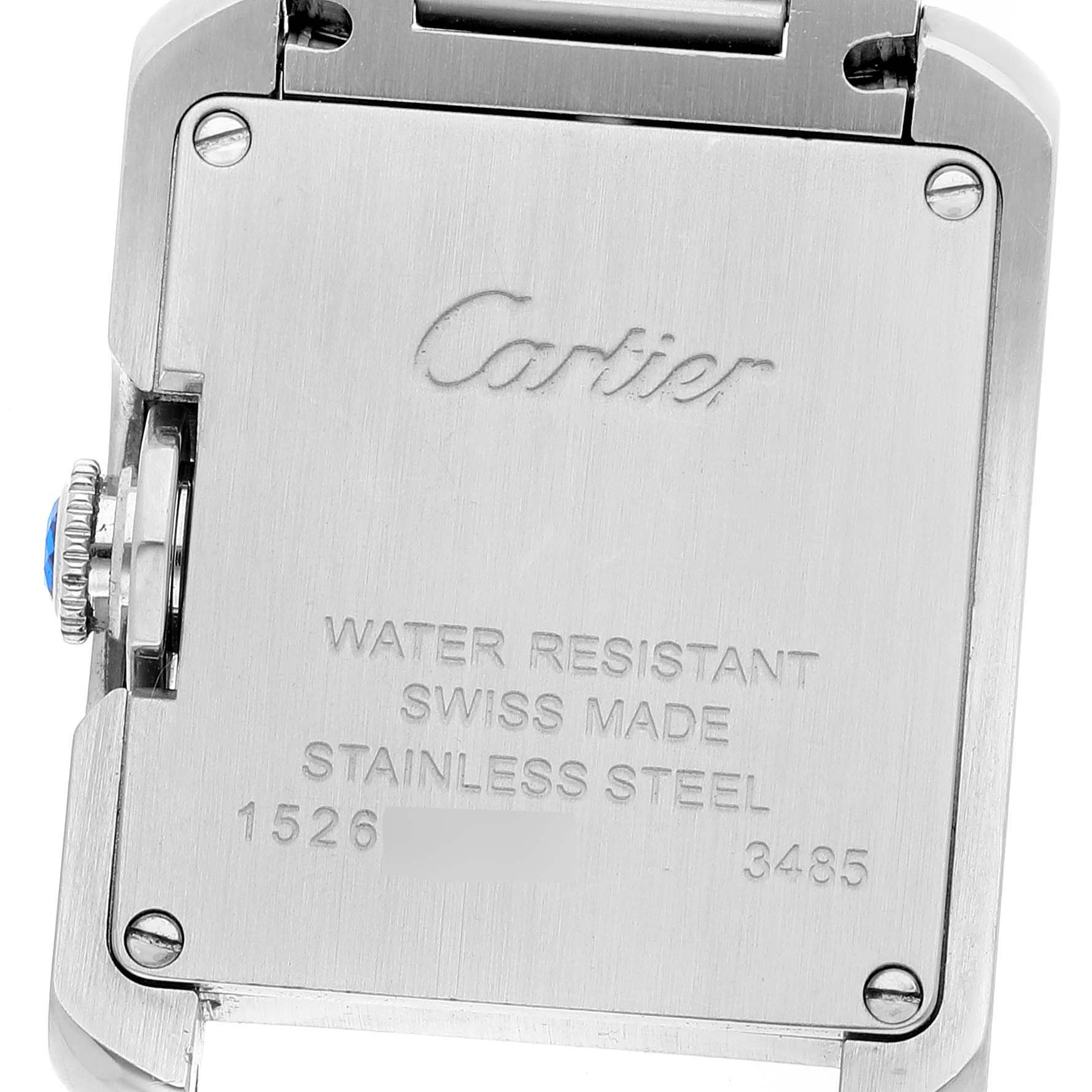 This image shows the back case of a Cartier Tank Anglaise W5310022 Women's Stainless Steel Silver Dial W5310022 Women's Stainless Steel Silver Dial watch, displaying the brand's logo and model details.