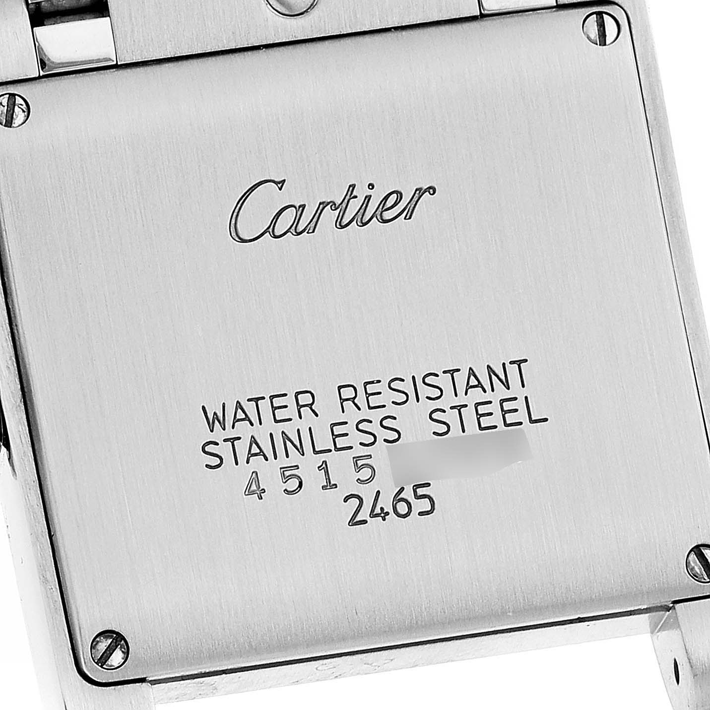 This image shows the back casing of the Cartier Tank Française watch, highlighting its "Water Resistant" and "Stainless Steel" inscriptions.