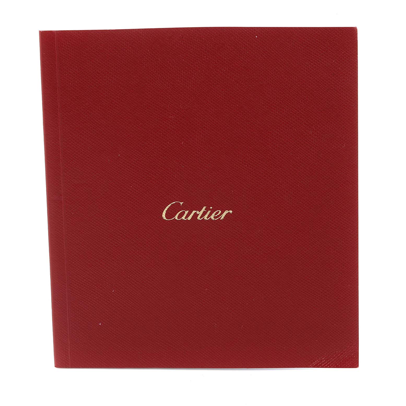 The image shows a red Cartier booklet, presumably an accessory for the Tank Louis model by Cartier.