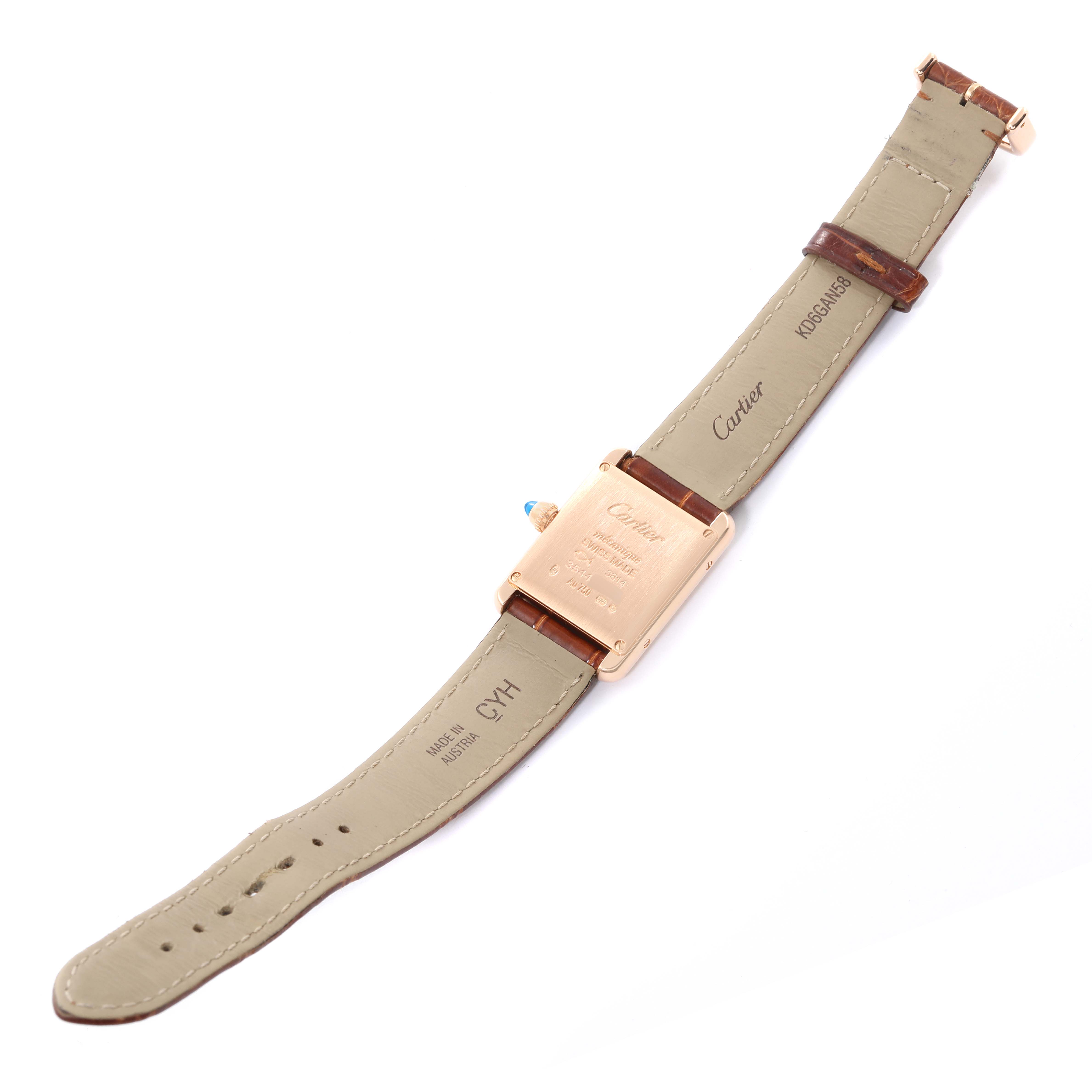 The Cartier Tank Louis WGTA0010 Women's Rose Gold Silver Dial WGTA0010 Women's Rose Gold Silver Dial watch is shown from the back, highlighting the case back, strap, and inscriptions.