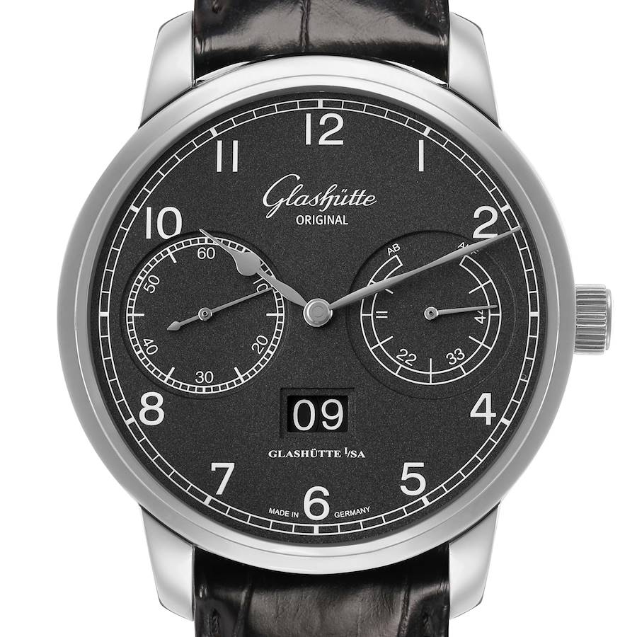 The Glashütte Senator watch is shown from a front angle, displaying its black dial, subdials, and date window.