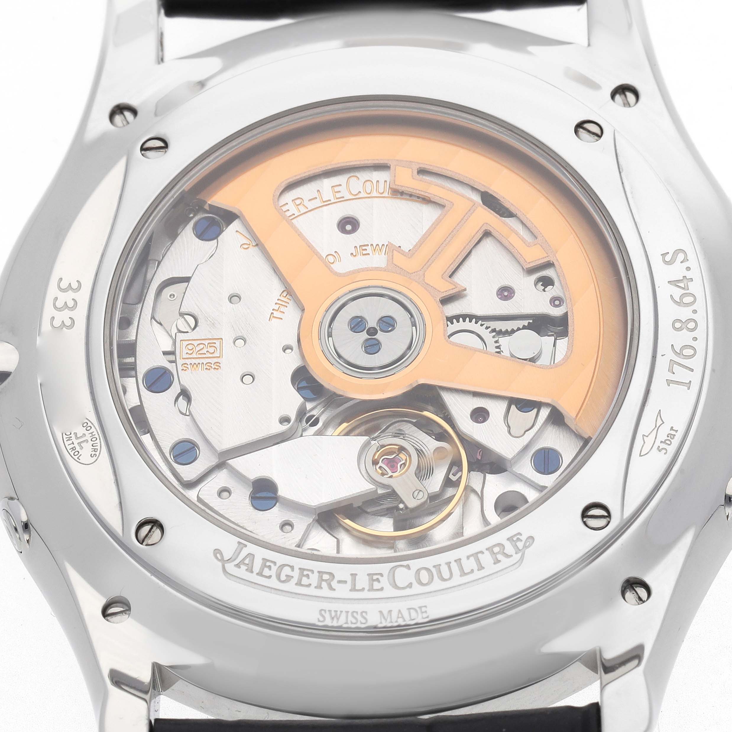 The image shows the back of a Jaeger-LeCoultre Master model watch, highlighting its intricate mechanical movement.