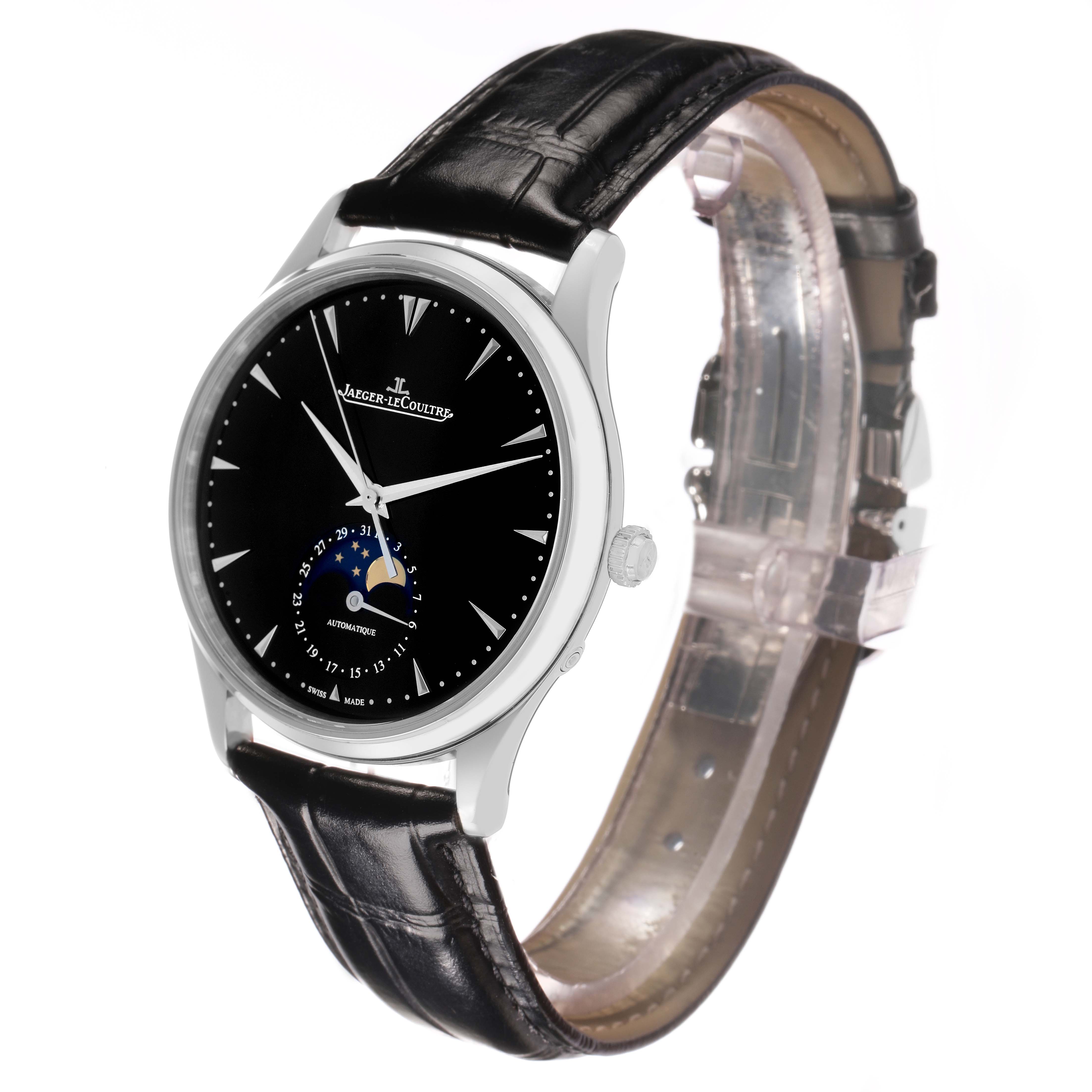The Jaeger-LeCoultre Master watch is shown at a slight angle, displaying its black dial, moonphase, and leather strap.