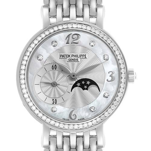 The Patek Philippe Calatrava watch is shown front-facing, highlighting its dial, bezel with diamonds, and part of the bracelet.