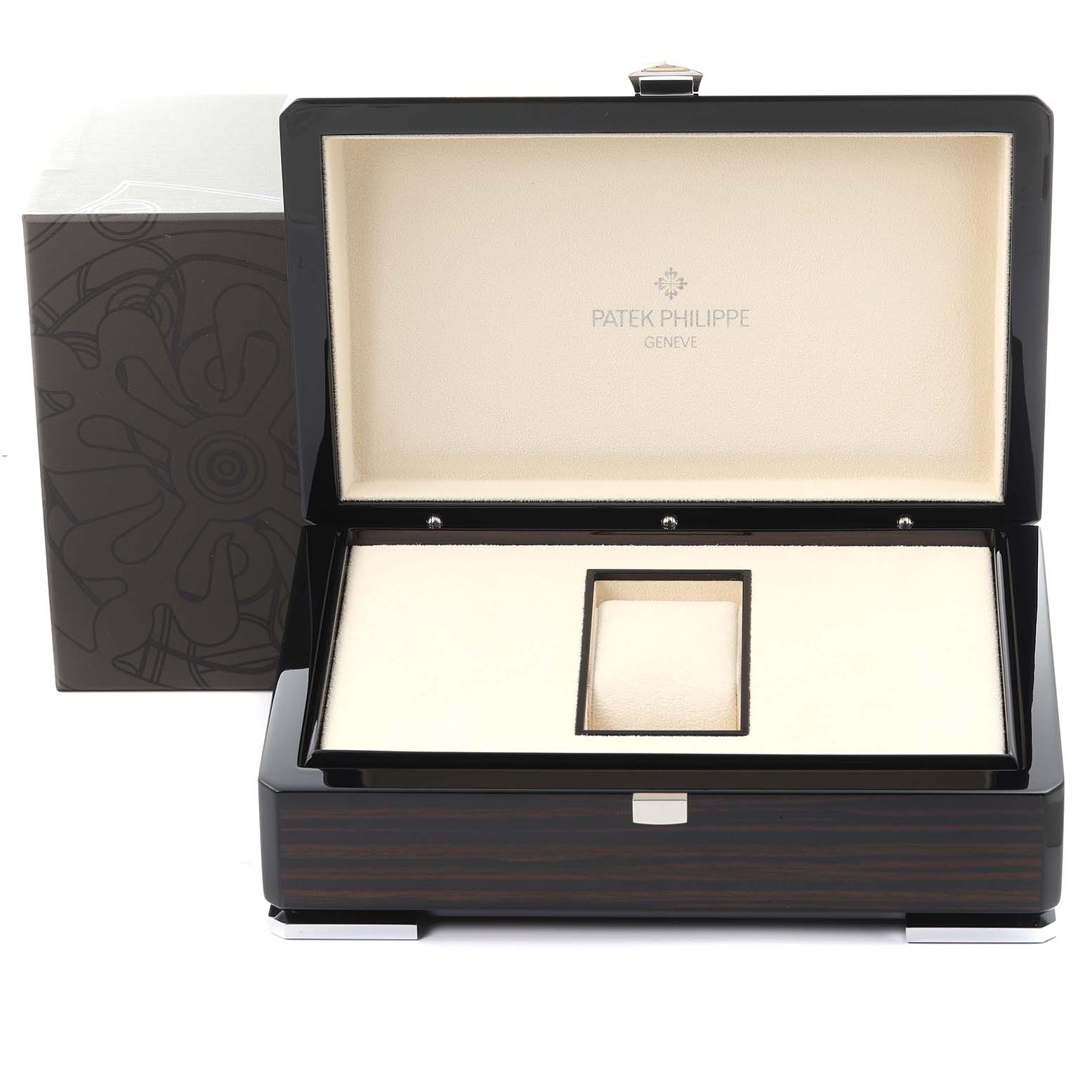 The image shows an open Patek Philippe Calatrava 4958/1G-001 Women's White Gold Silver Dial 4958/1G-001 Women's White Gold Silver Dial watch box from a front angle, displaying the interior and packaging details.