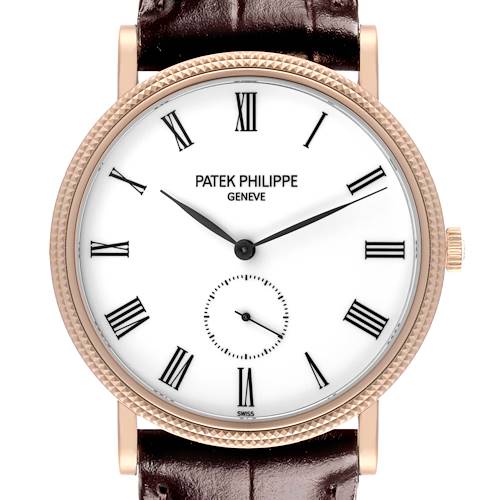 The Patek Philippe Calatrava watch is shown from the front, displaying the dial, hands, Roman numerals, and part of the leather strap.