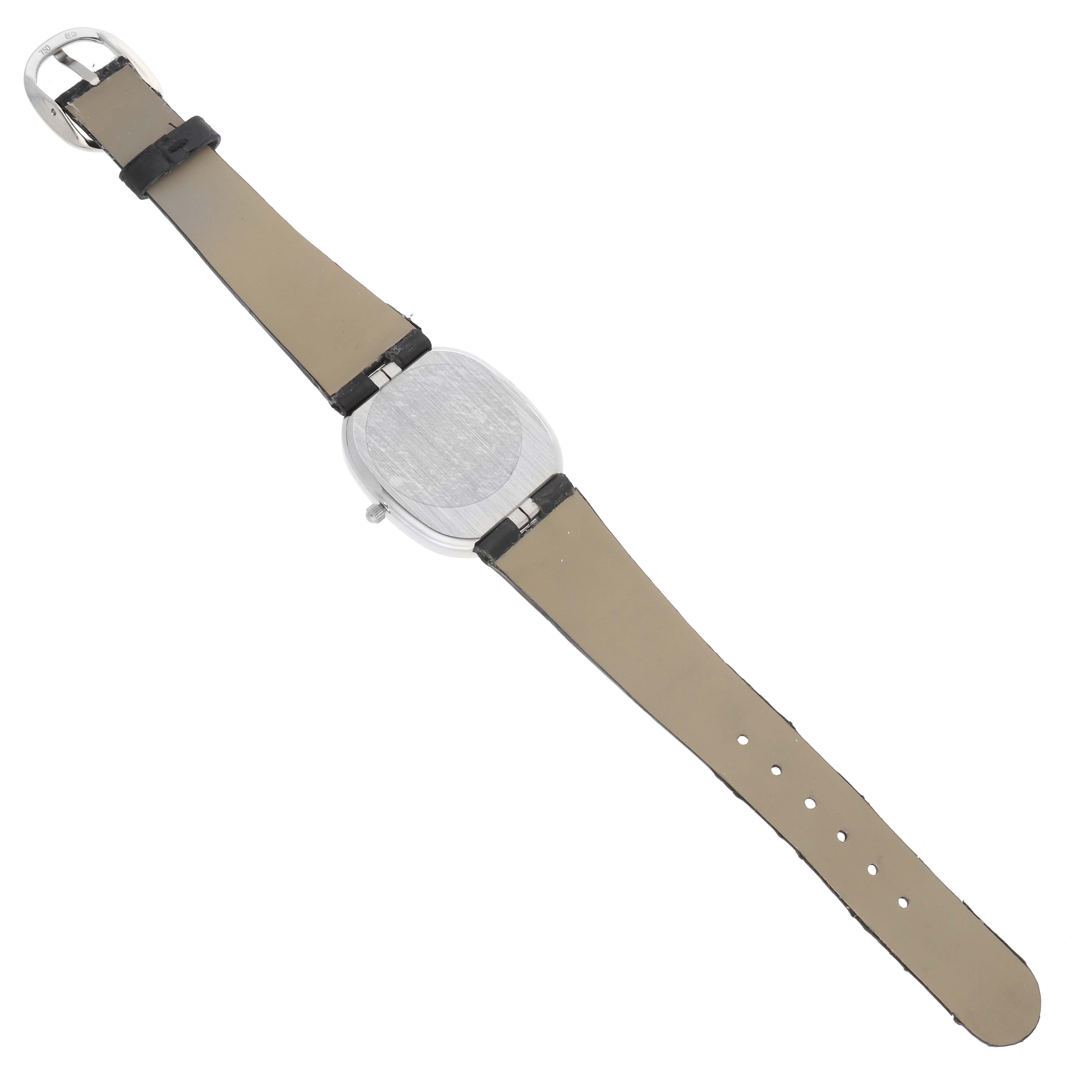 The Patek Philippe Golden Ellipse 3738 Men's White Gold Blue Dial watch is shown from the back, highlighting the strap, buckle, and case back.