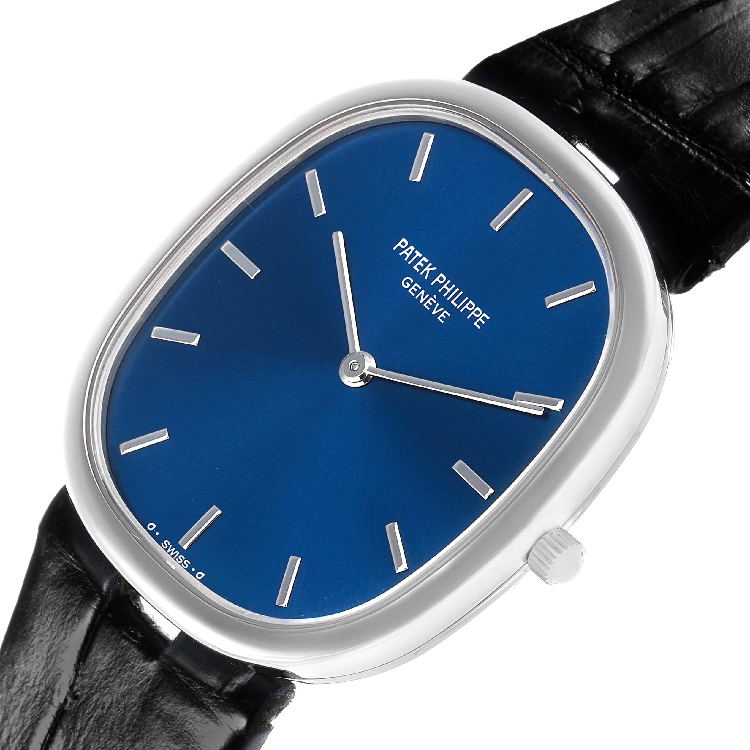 The Patek Philippe Golden Ellipse 3738 Men's White Gold Blue Dial watch is shown at a slight angle, displaying its blue dial, silver indices, case, and crown.