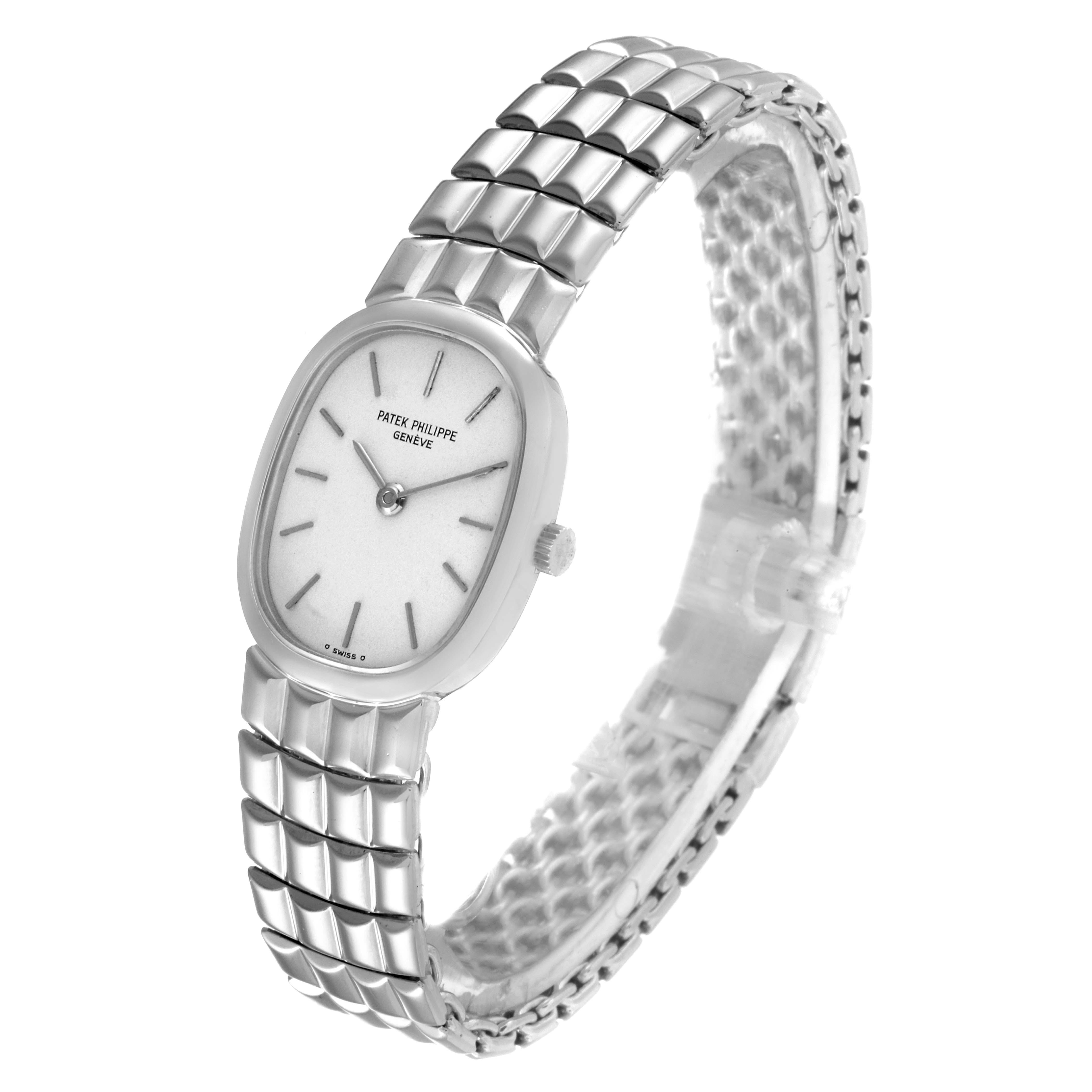 The image shows a three-quarter view of the Patek Philippe Golden Ellipse 4764/15 Women's White Gold Silver Dial 4764/15 Women's White Gold Silver Dial watch, displaying the face, bezel, crown, and bracelet.