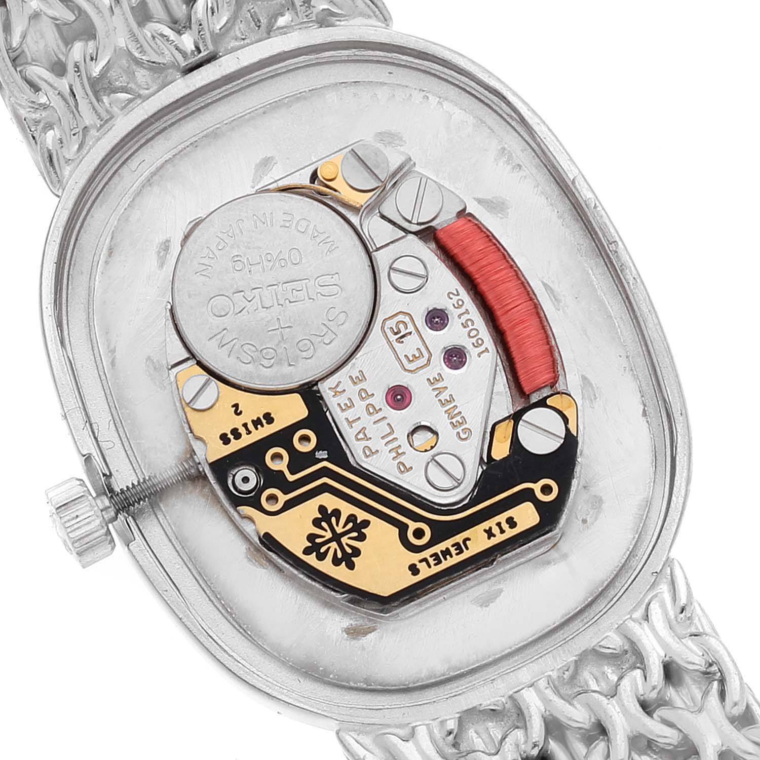 This image shows the internal mechanics and battery compartment of the Patek Philippe Golden Ellipse 4764/15 Women's White Gold Silver Dial 4764/15 Women's White Gold Silver Dial watch from a close-up bottom view.