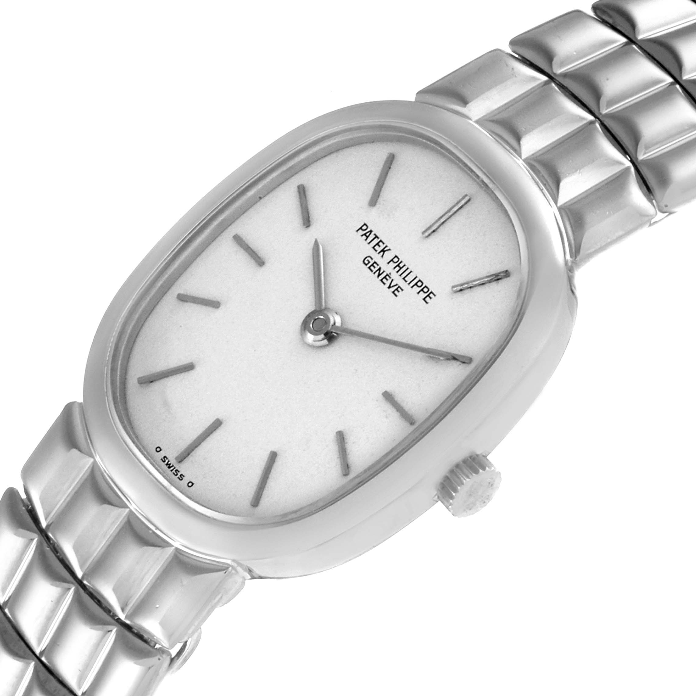 The image shows a close-up of the Golden Ellipse model by Patek Philippe, highlighting the dial, hands, crown, and part of the bracelet.