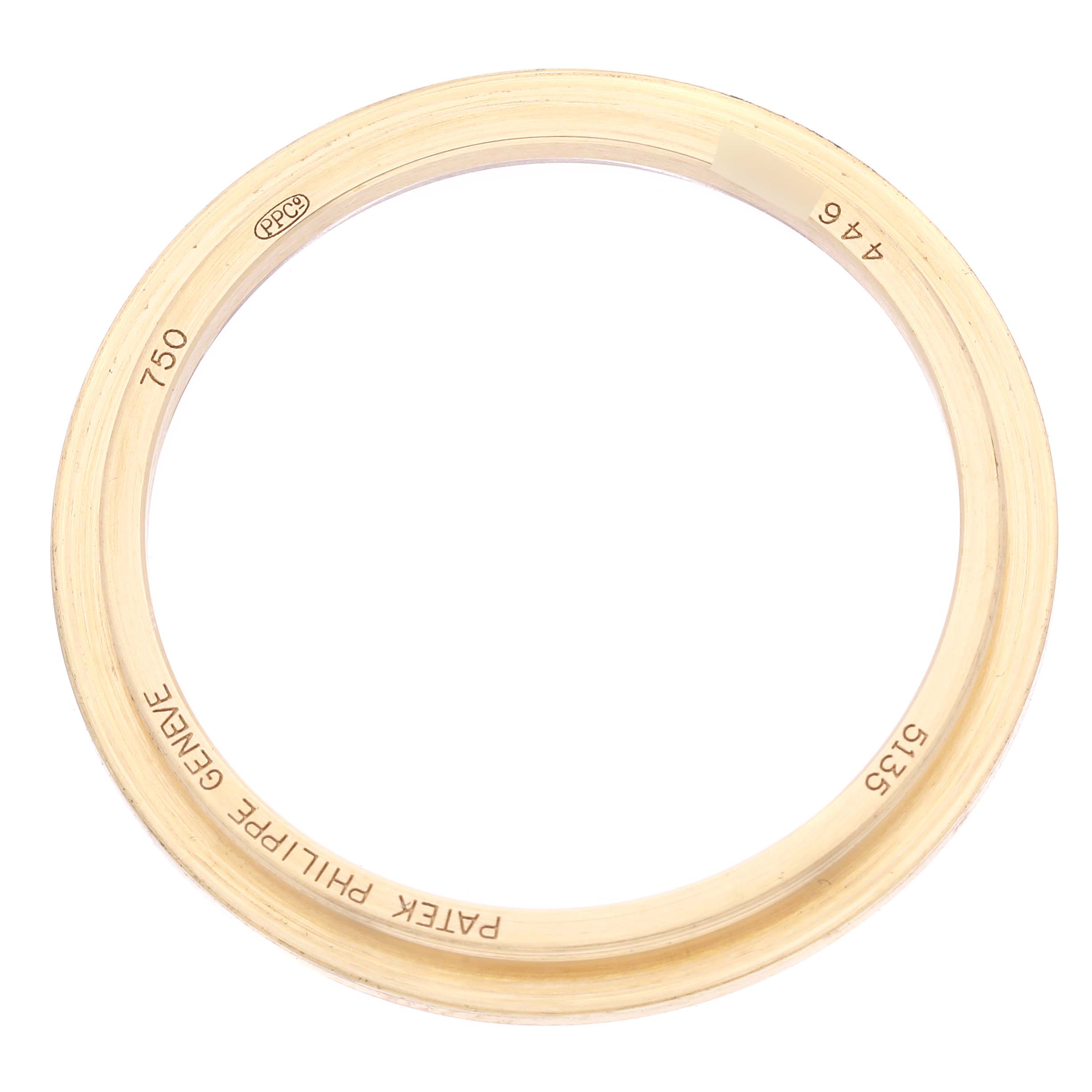 The image shows a gold bezel for a Patek Philippe Gondolo 5135J-001 Men's Yellow Gold Silver Dial 5135J-001 Men's Yellow Gold Silver Dial watch viewed from above.