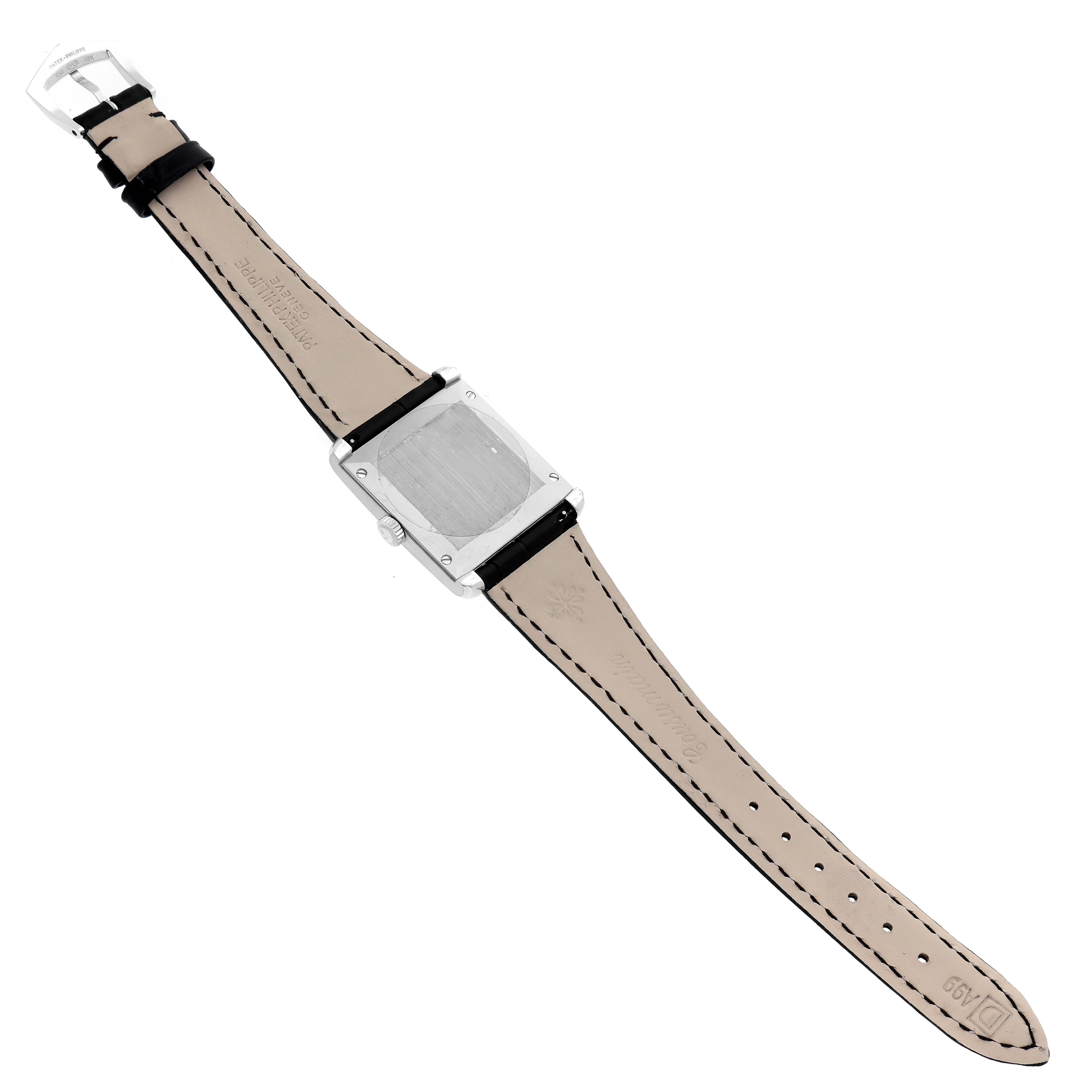 The image shows the back view of a Patek Philippe Gondolo 5014 Men's White Gold Silver Dial watch, featuring its rectangular case and leather strap.