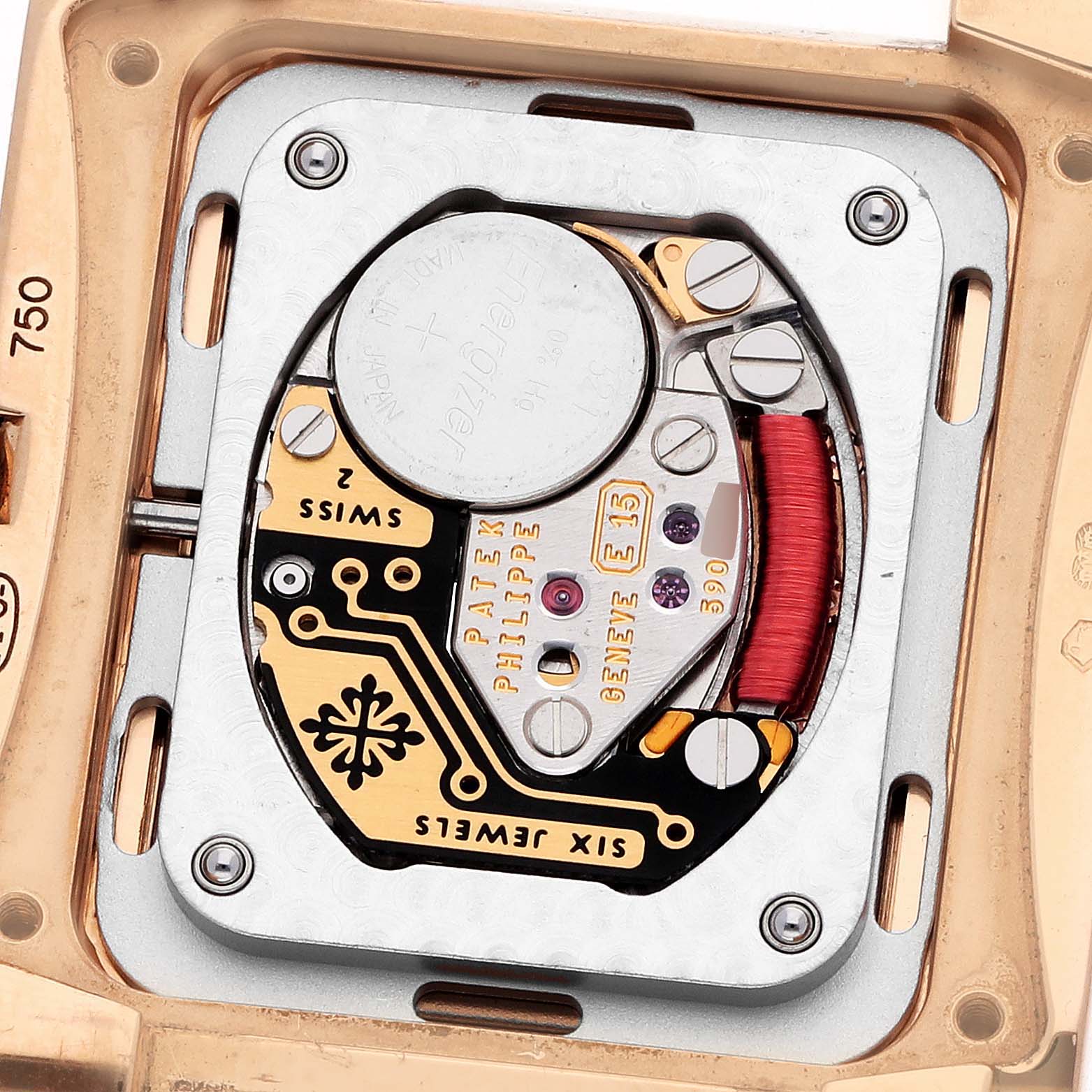 The image shows a close-up of the movement inside a Patek Philippe Twenty-4 4910 Women's Rose Gold Brown Dial watch from the back.