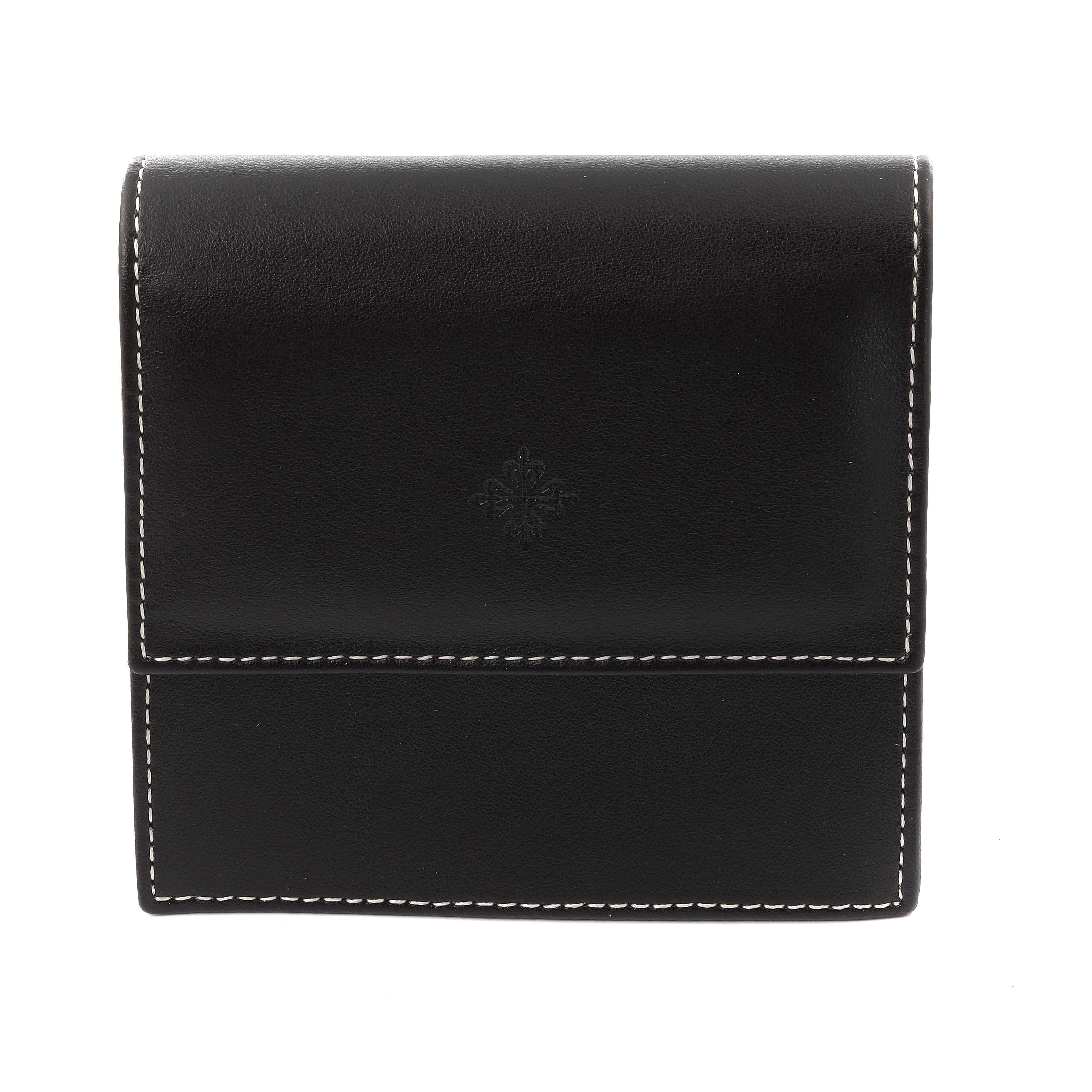 The image shows a closed black leather case for the Patek Philippe Twenty-4 4910 Women's Rose Gold Brown Dial watch, viewed from the front.