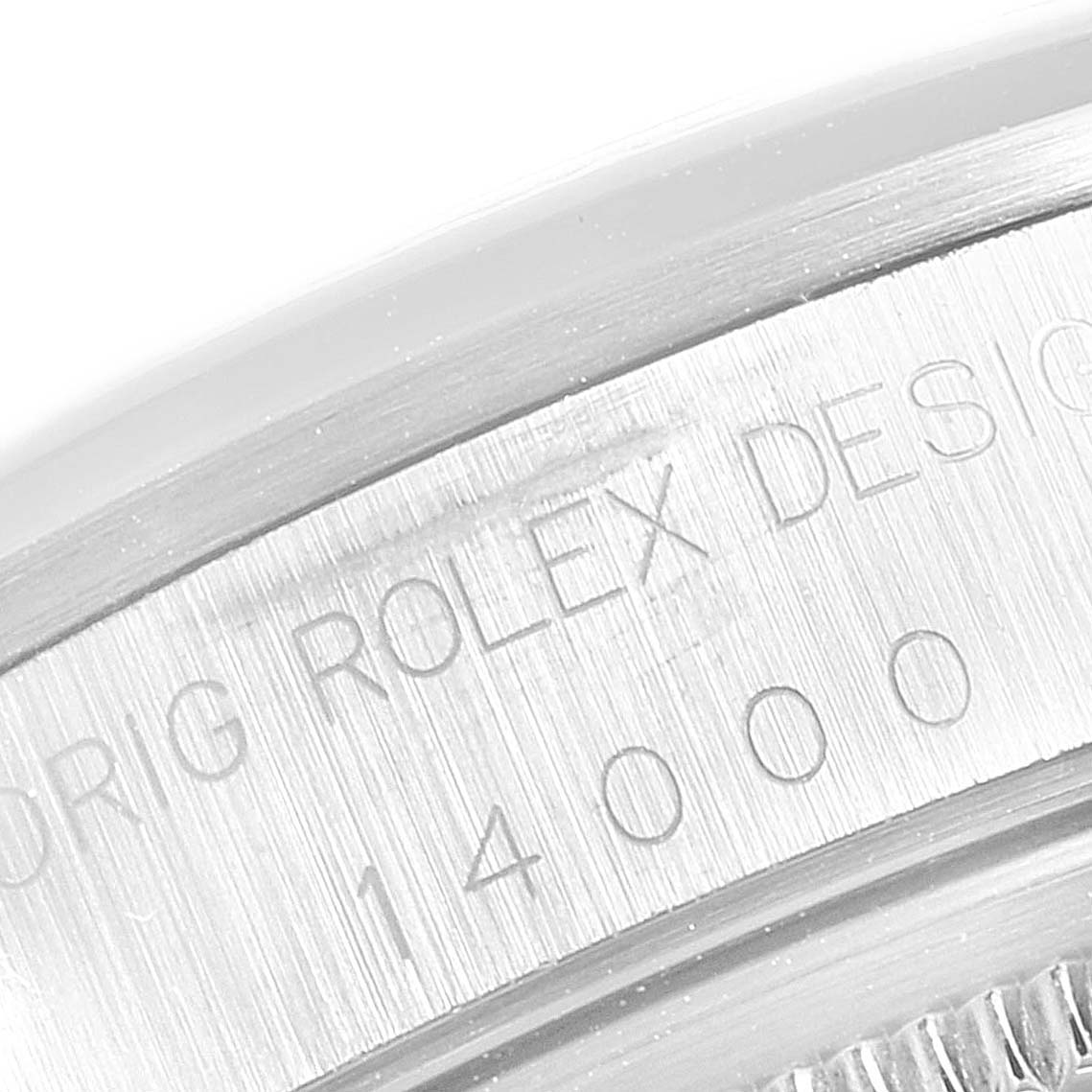 This image shows a close-up of the case back edge, engraving details, and serial number of the Rolex Air-King 14000 Men's Stainless Steel Blue Dial 14000 Men's Stainless Steel Blue Dial watch.