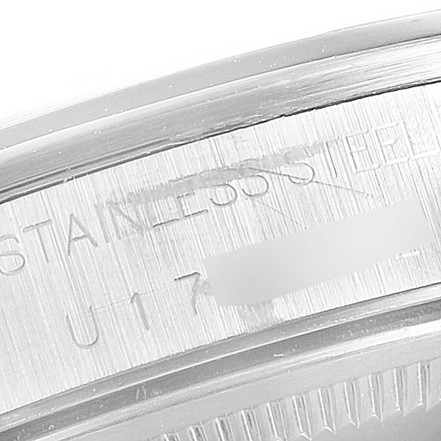 The image shows a close-up of the serial number engraving on the case of a Rolex Air-King 14000 Men's Stainless Steel Pink Dial 14000 Men's Stainless Steel Pink Dial watch.
