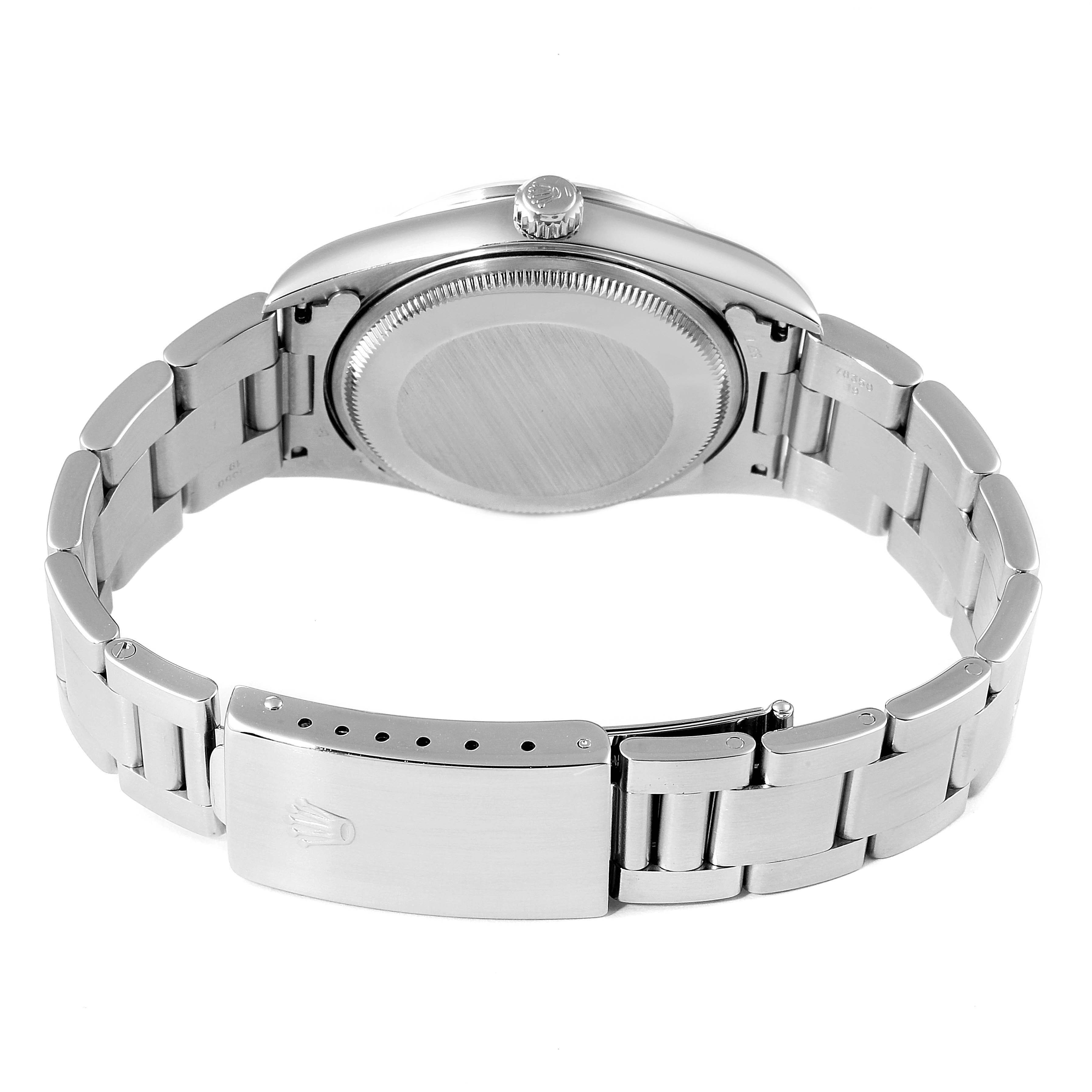 The image shows the back of the Rolex Air-King 14000 Men's Stainless Steel Pink Dial 14000 Men's Stainless Steel Pink Dial watch, highlighting its clasp, bracelet, and case back.