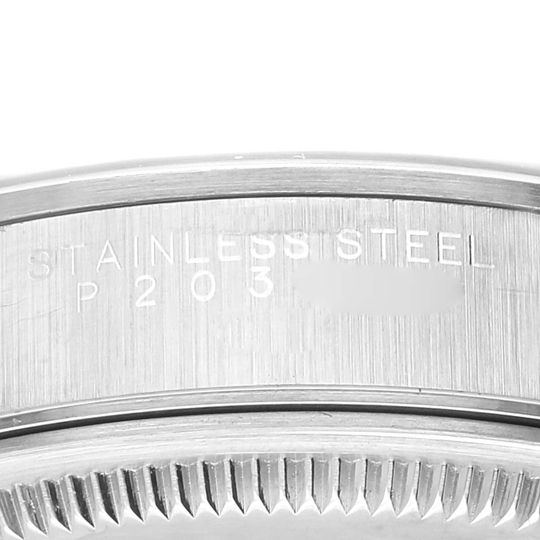 This image shows a close-up of the stainless steel case back of a Rolex Air-King 14000 Men's Stainless Steel Blue Dial 14000 Men's Stainless Steel Blue Dial watch.