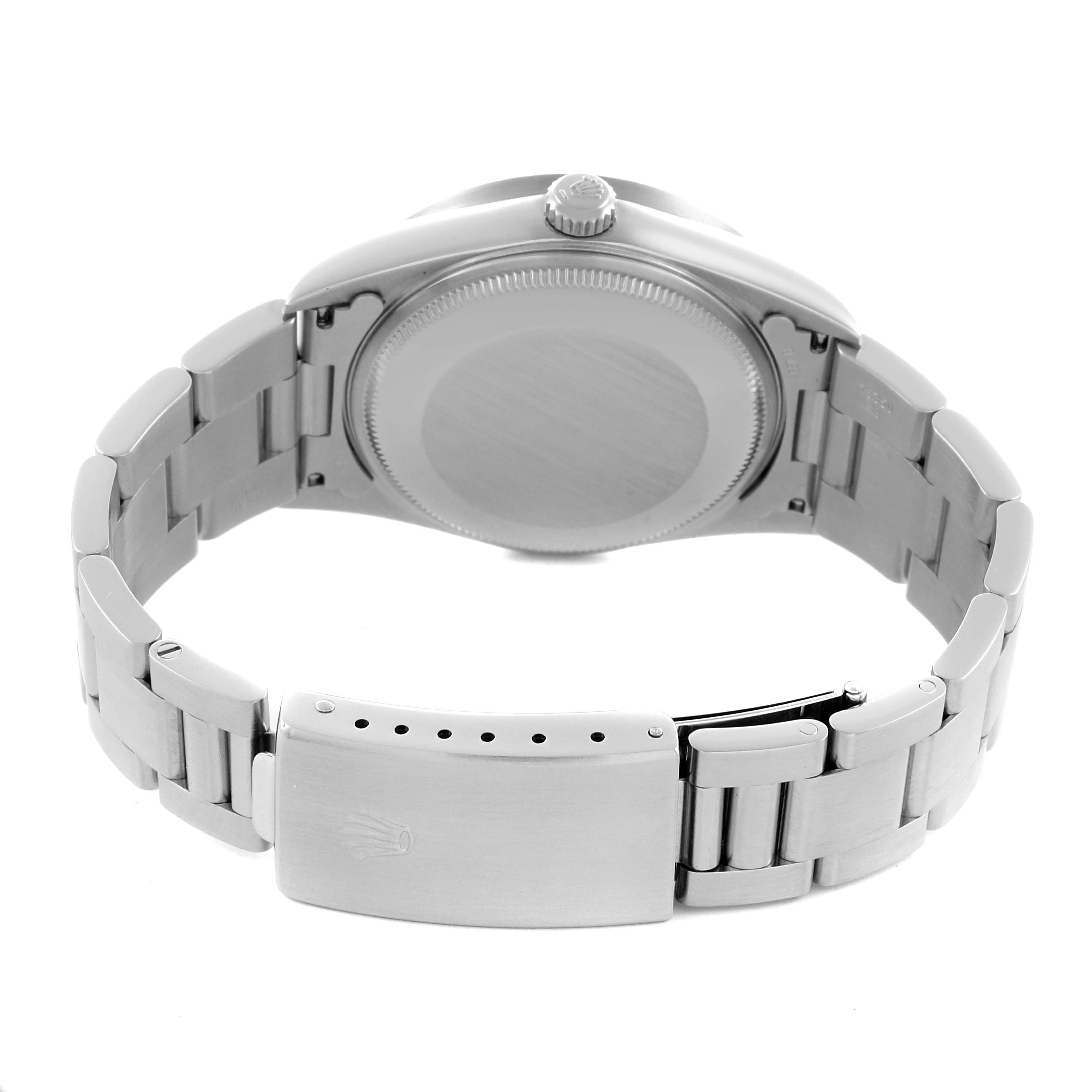 The image shows the back view of a Rolex Air-King 14010M Men's Stainless Steel Blue Dial 14010M Men's Stainless Steel Blue Dial, highlighting the case back, bracelet, and clasp.