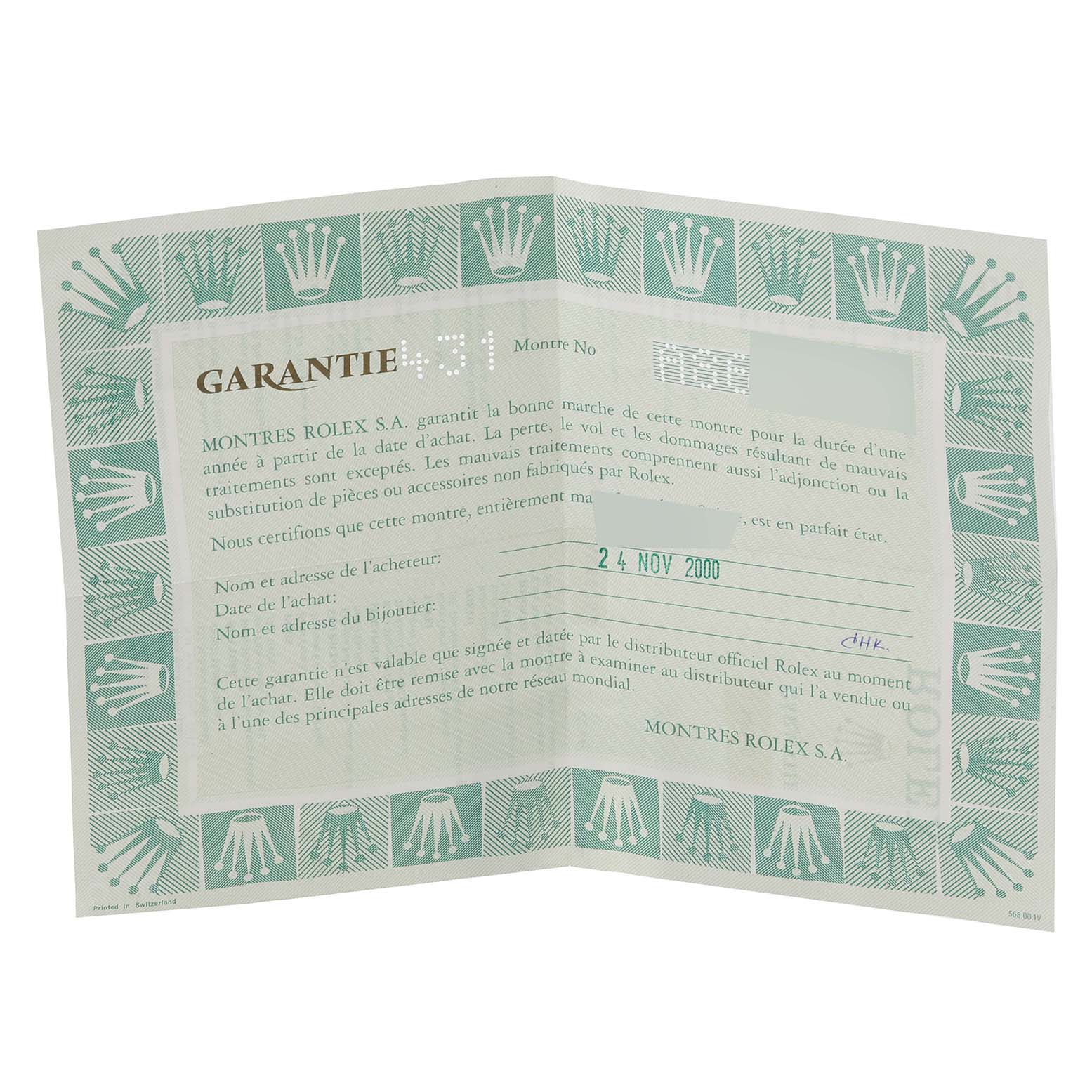 The image shows a warranty certificate for a Rolex Air-King 14010 Men's Stainless Steel Blue Dial 14010 Men's Stainless Steel Blue Dial watch, displayed at an angled view.