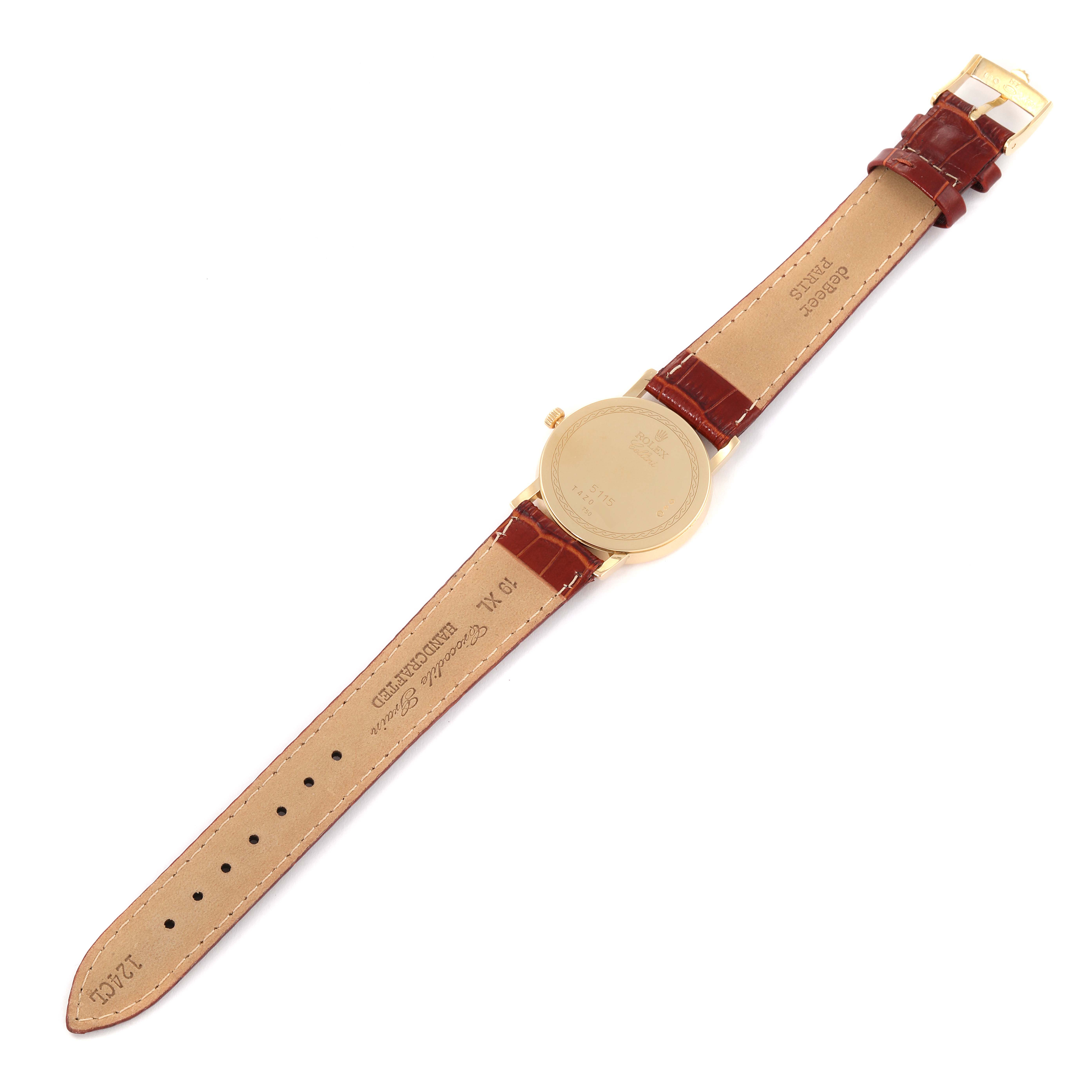 This image shows the back view of a Rolex Cellini 5115 Men's Yellow Gold Beige Dial 5115 Men's Yellow Gold Beige Dial watch, highlighting the gold case and brown leather strap with its buckle.