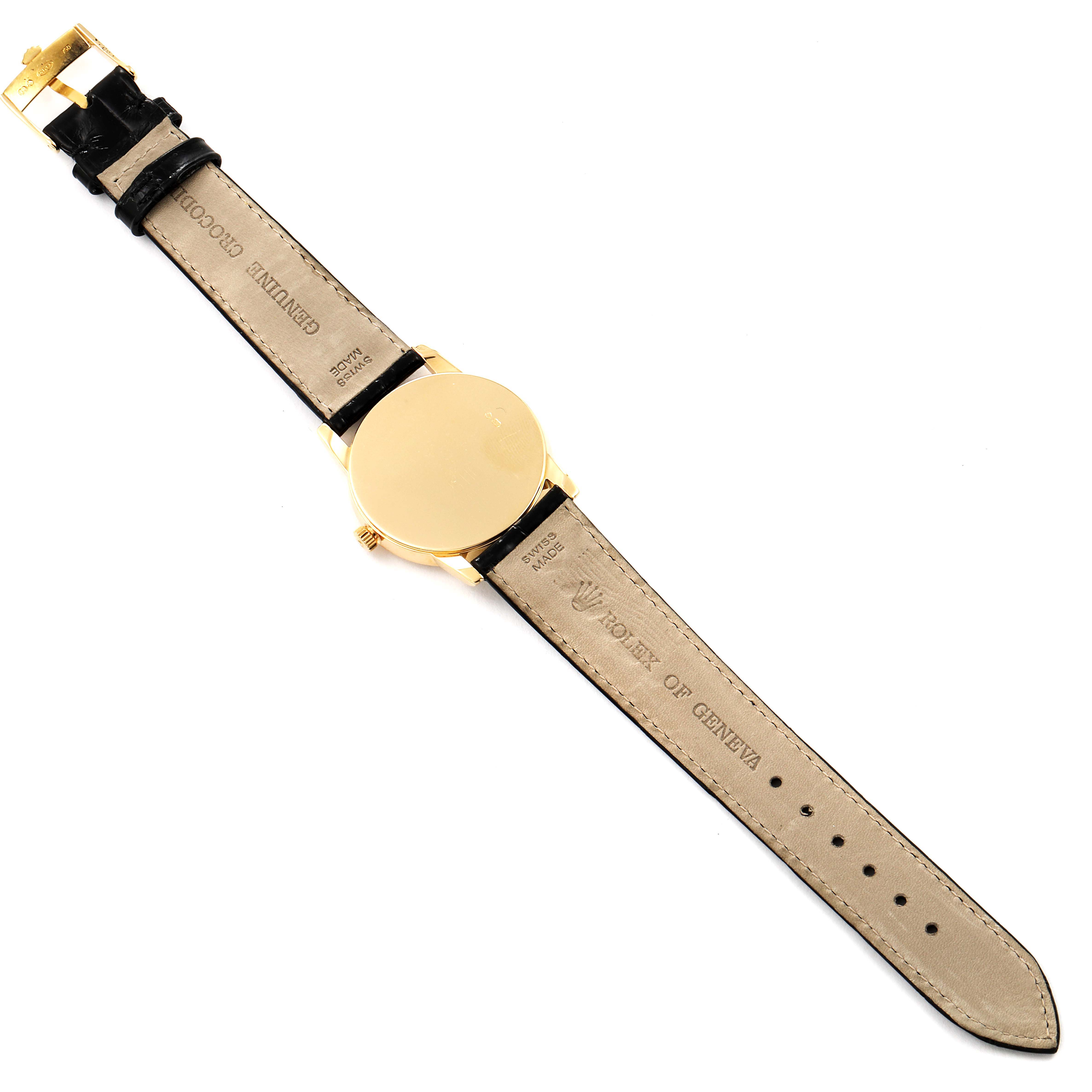 The image shows the back view of a Rolex Cellini 5116 Men's Yellow Gold Mother of Pearl Dial 5116 Men's Yellow Gold Mother of Pearl Dial watch with its full leather strap laid flat.