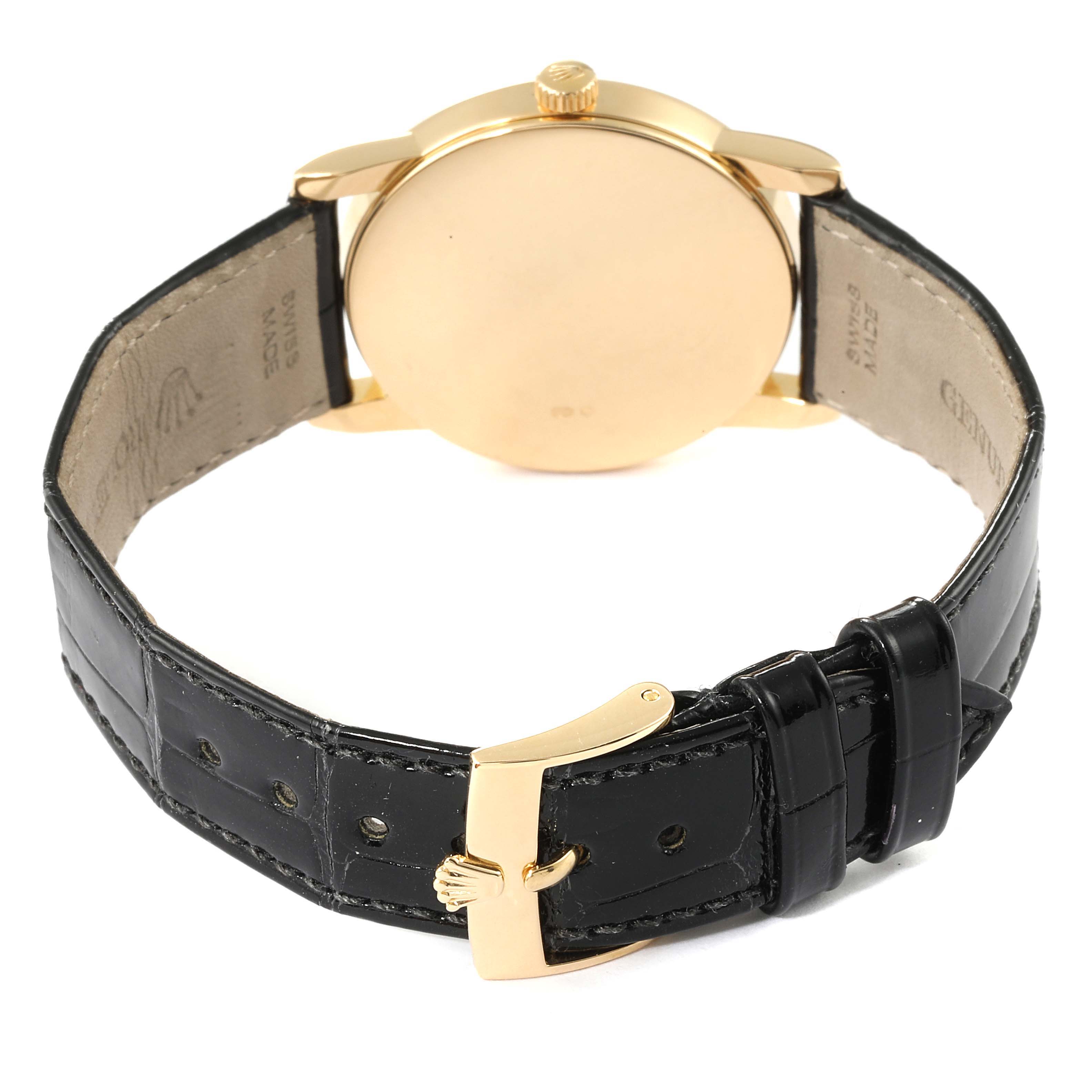 The image shows the back case and strap of a Rolex Cellini 5116 Men's Yellow Gold Mother of Pearl Dial 5116 Men's Yellow Gold Mother of Pearl Dial watch, highlighting its leather strap and gold buckle.