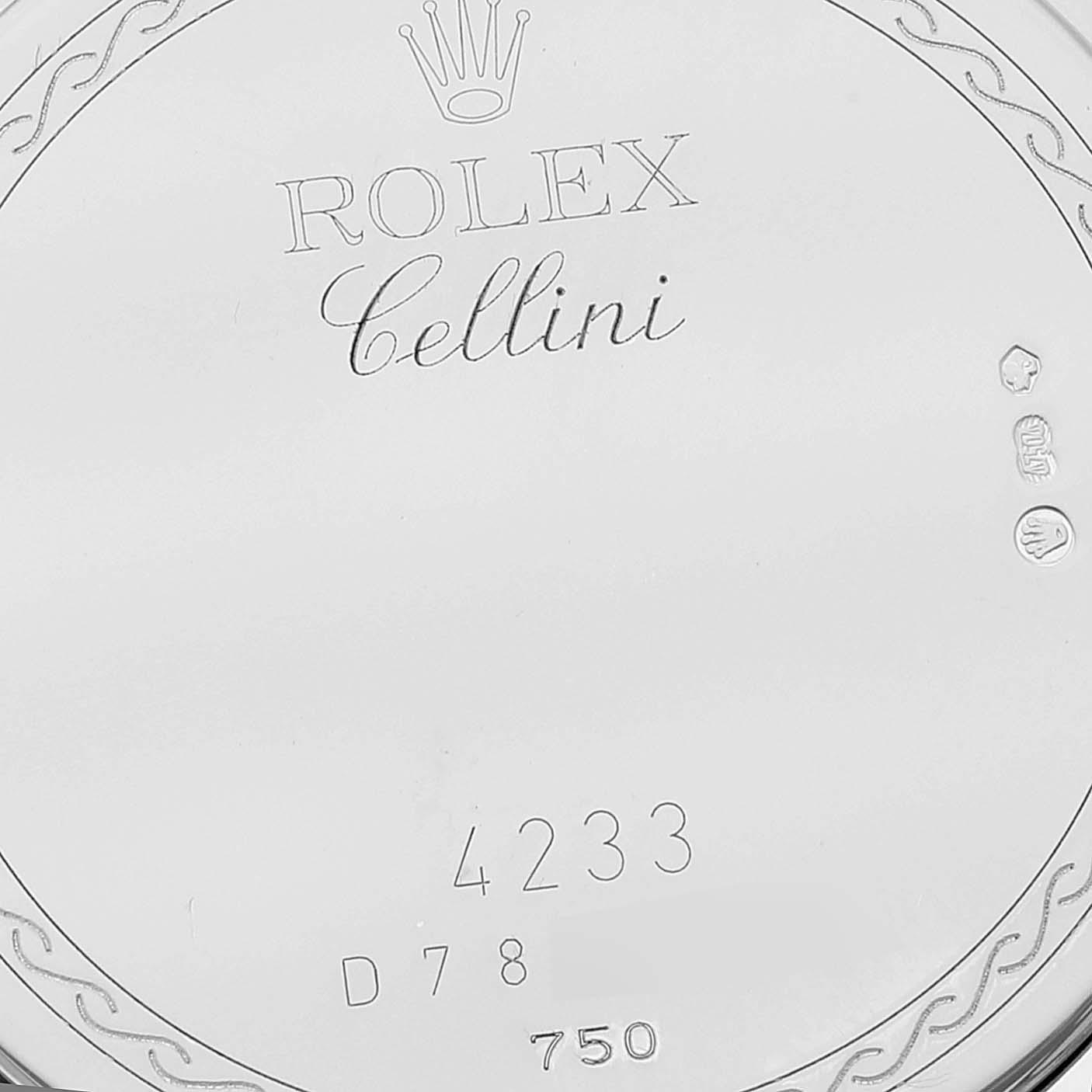 The image shows the back case of a Rolex Cellini 4233 Men
s White Gold Black Dial 4233 Men
s White Gold Black Dial watch with engraved branding and numbers.
