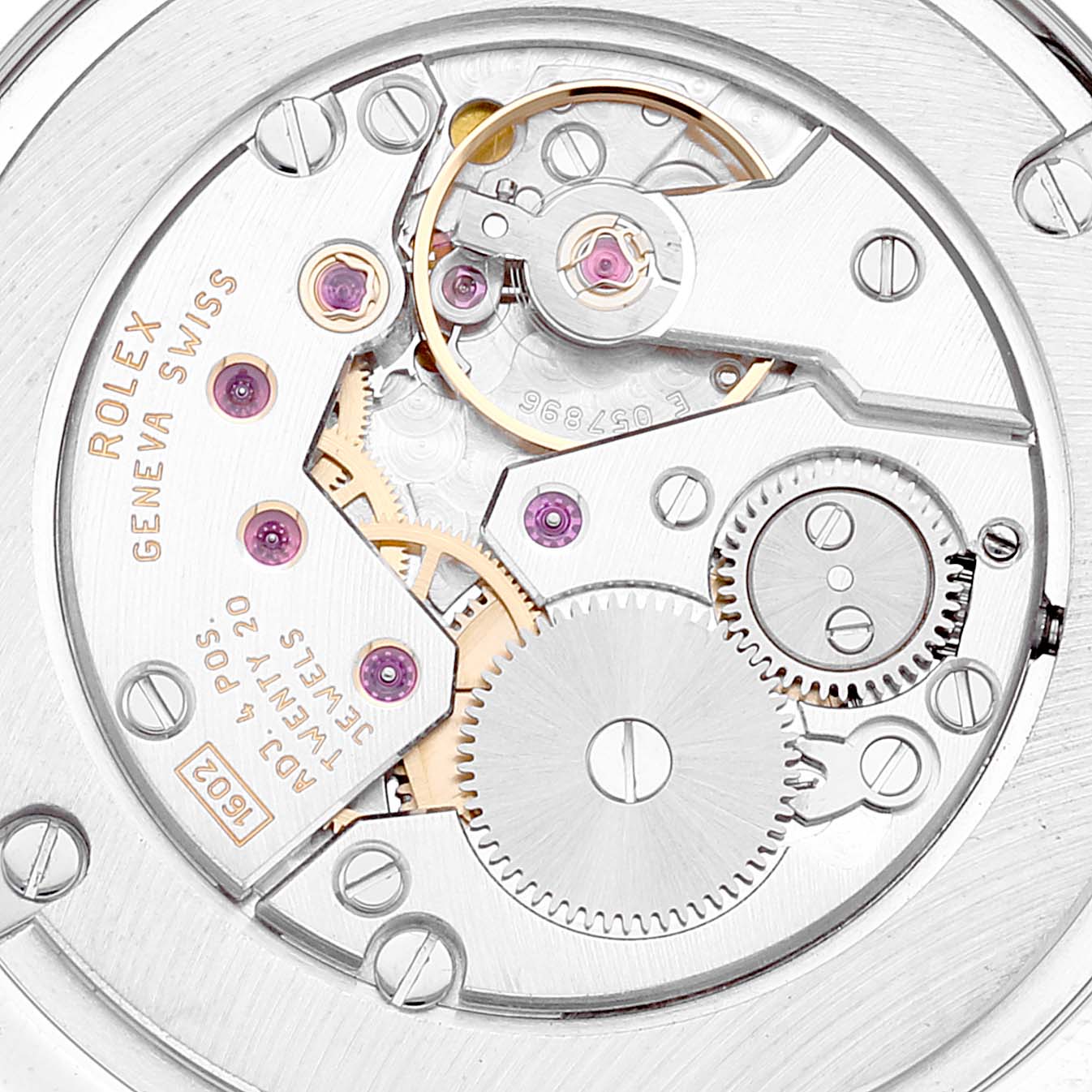 The image shows a close-up view of the Rolex Cellini 4233 Men
s White Gold Black Dial 4233 Men
s White Gold Black Dial
s watch movement, highlighting gears, screws, and jewels.
