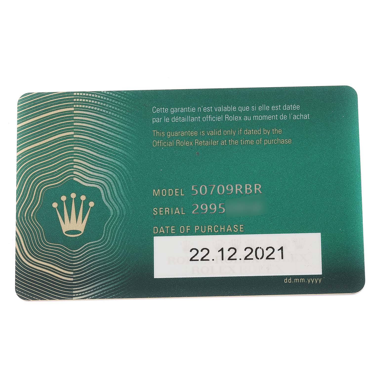 This image shows the warranty card for a Rolex Cellini 50709 Men's White Gold Silver Dial 50709 Men's White Gold Silver Dial model 50709RBR, featuring details like serial number and date of purchase.