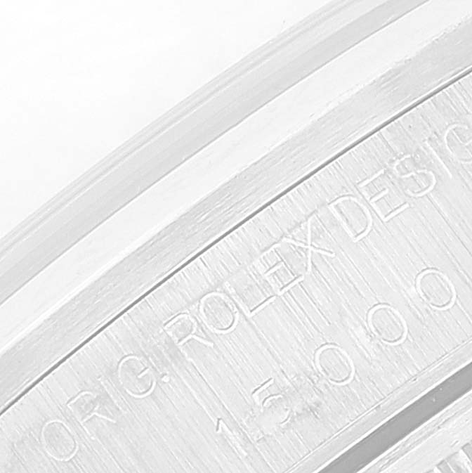 The image shows a close-up of the engraved serial number and text on the Rolex Date 15200 Men
s Stainless Steel Black Dial 15200 Men
s Stainless Steel Black Dial model watch casing.