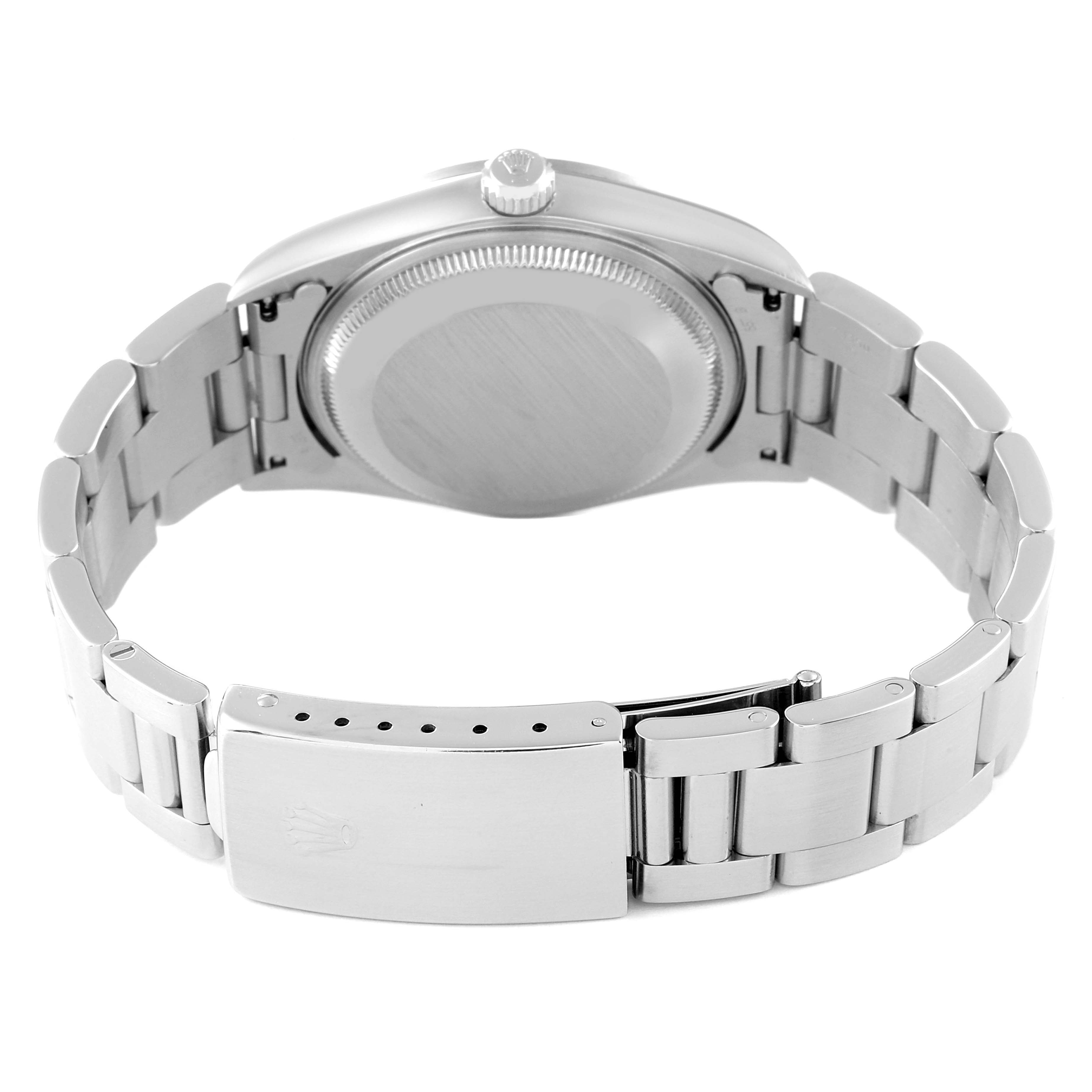 This image shows the back view of a Rolex Date 15200 Men
s Stainless Steel Black Dial 15200 Men
s Stainless Steel Black Dial model watch, focusing on the case back and the closed clasp of the bracelet.