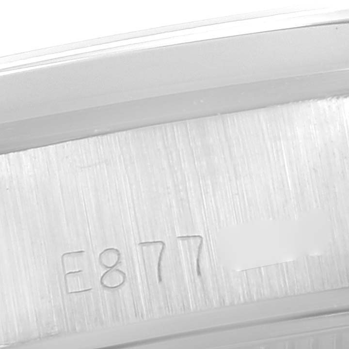 This is a close-up view of the serial number engraved on the case of a Rolex Date 69160 Women
s Stainless Steel Blue Dial 69160 Women
s Stainless Steel Blue Dial model watch.