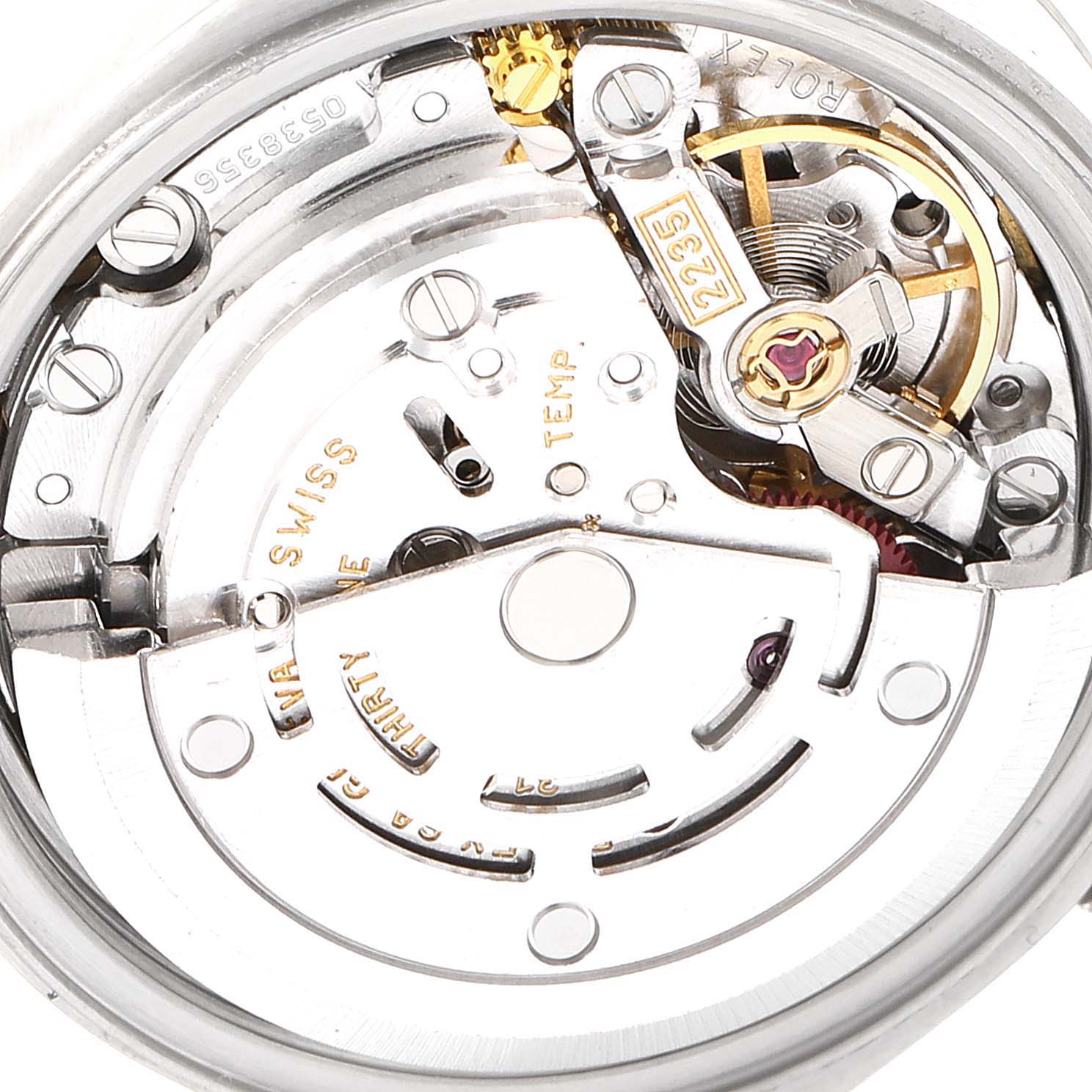 This image shows a close-up of the internal mechanism of a Rolex Date 79190 Women's Stainless Steel White Dial 79190 Women's Stainless Steel White Dial model watch, focusing on its Swiss movement components.