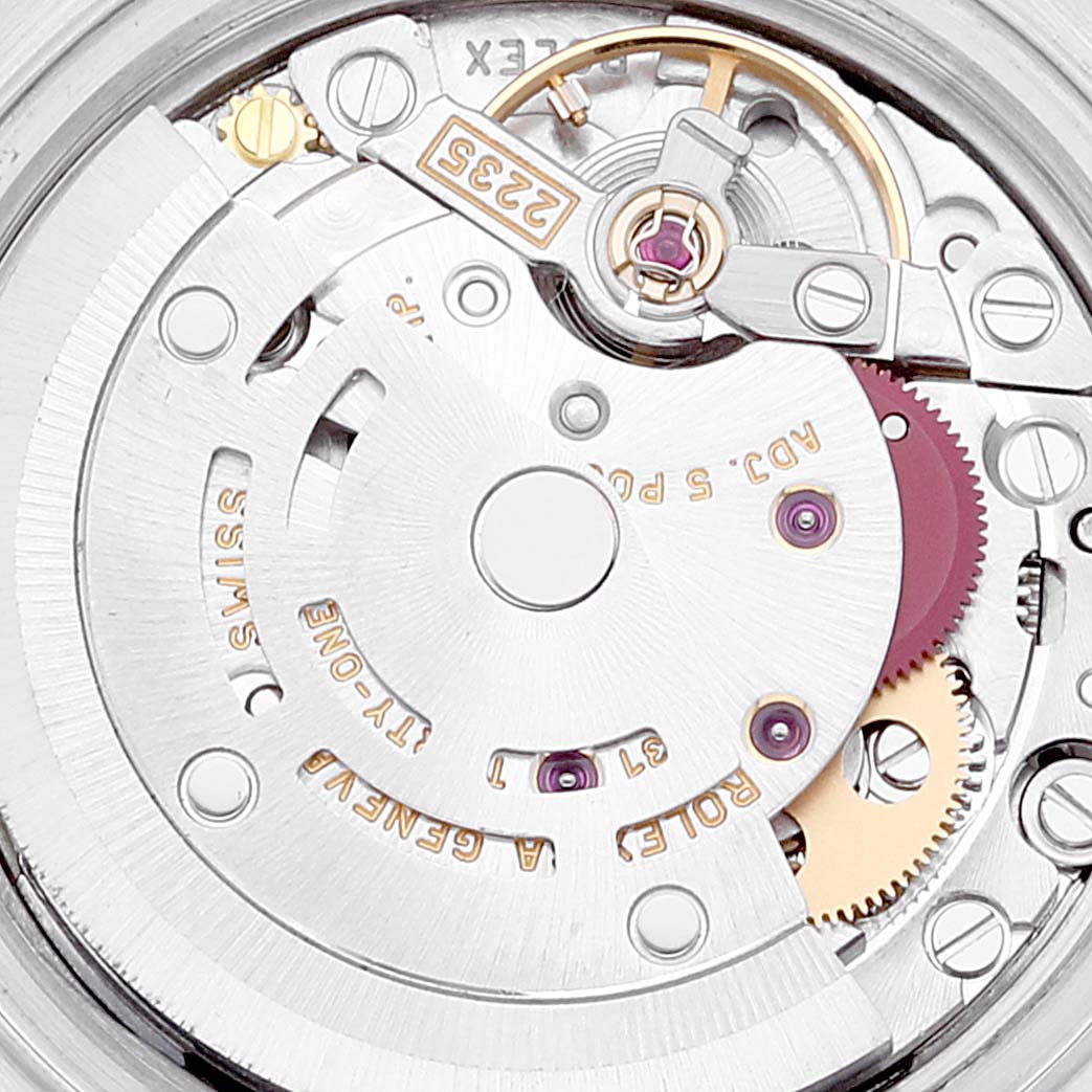 This close-up image shows the movement mechanism of the Rolex Datejust 79174 Women's Stainless Steel Silver Dial 79174 Women's Stainless Steel Silver Dial watch with visible gears and components.