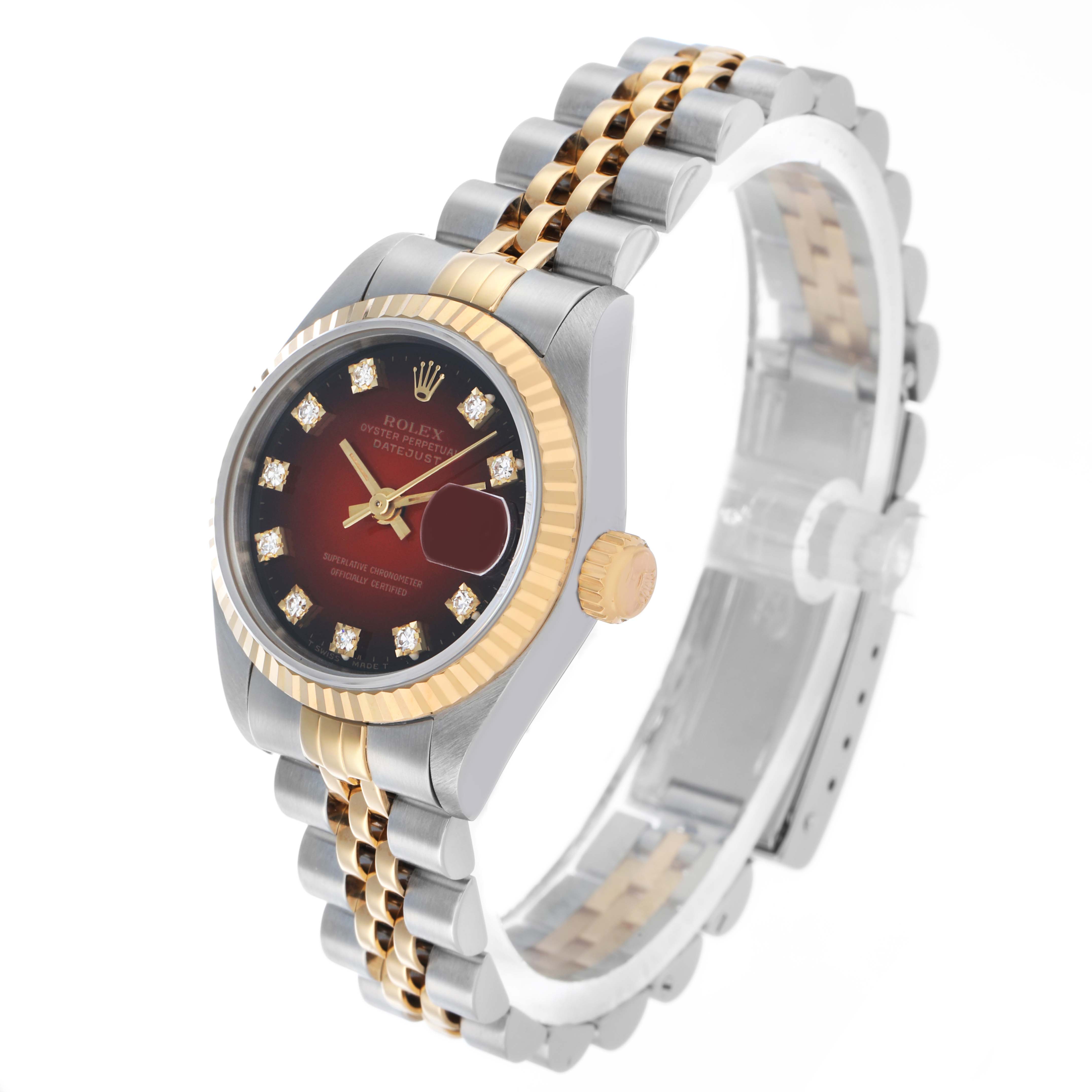 The Rolex Datejust 69173 Women's Stainless Steel Red Dial watch is shown at a three-quarter angle, highlighting the bezel, dial, bracelet, and crown.