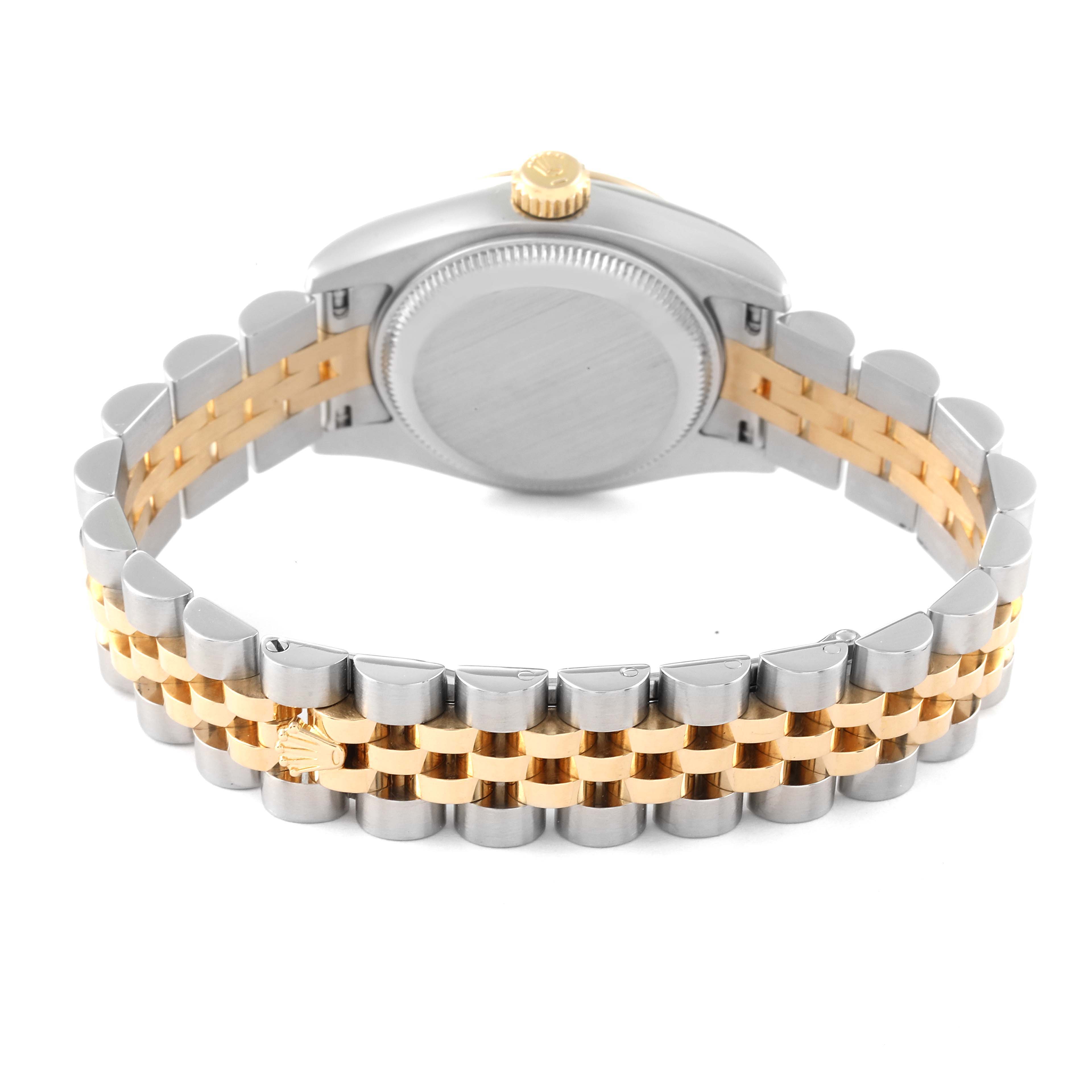 This image shows the back of the Rolex Datejust 179173 Women's Steel and Gold (two tone) Champagne Dial 179173 Women's Steel and Gold (two tone) Champagne Dial watch, highlighting its two-tone bracelet and the case back.