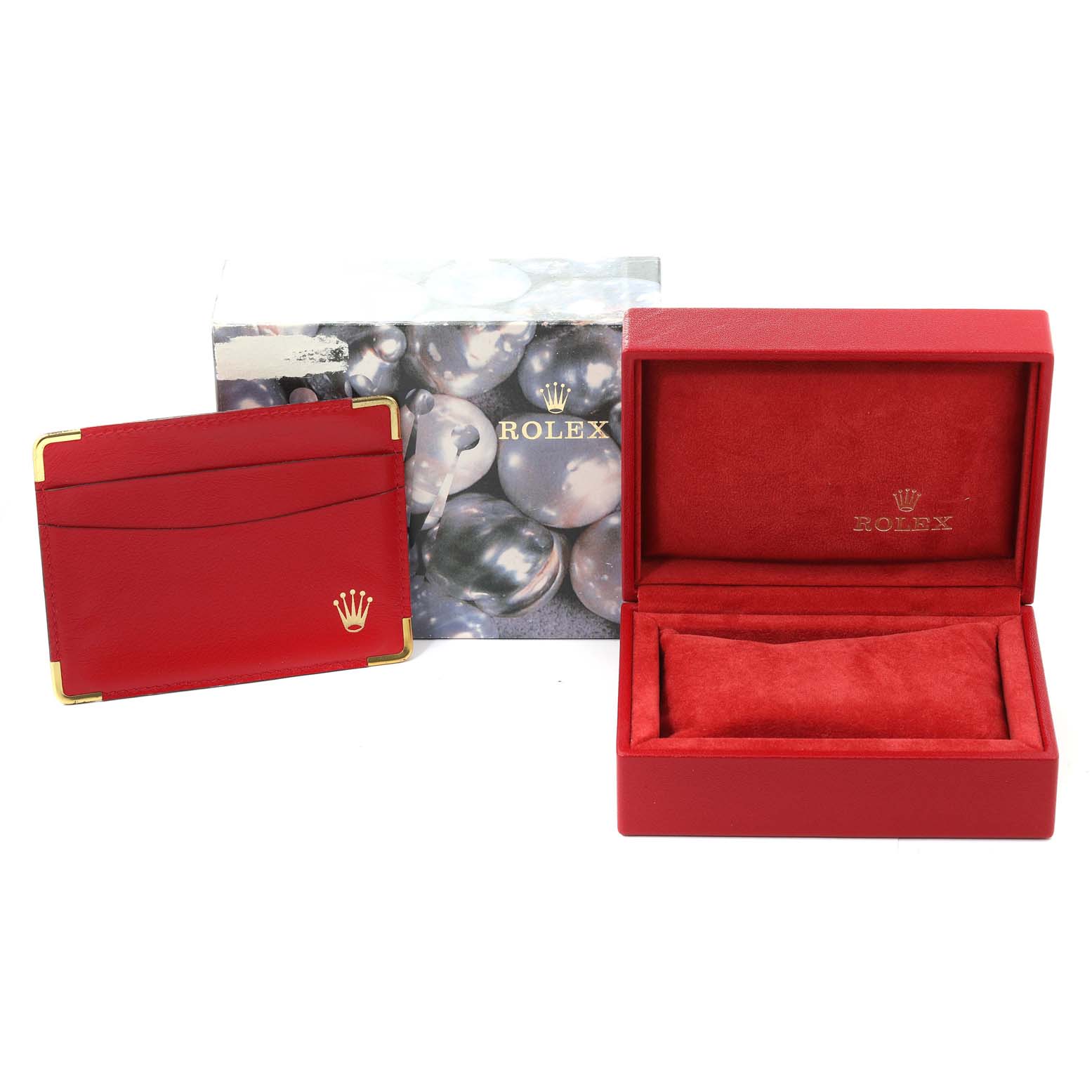 The image shows red packaging and accessories for a Rolex Datejust 69173 Women's Steel and Gold (two tone) Champagne Dial 69173 Women's Steel and Gold (two tone) Champagne Dial watch, including a card holder, inner and outer boxes.