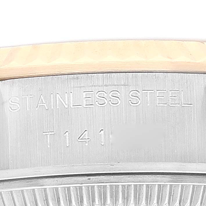 This image shows a close-up view of the stainless steel casing of a Rolex Datejust 69173 Women's Steel and Gold (two tone) Champagne Dial 69173 Women's Steel and Gold (two tone) Champagne Dial watch.