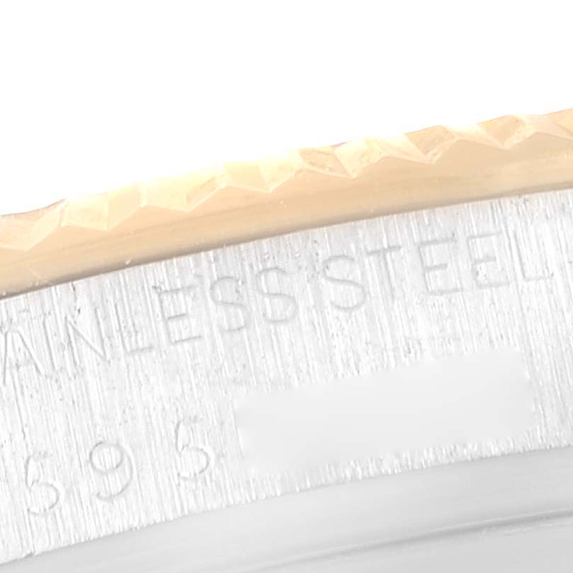 The image shows a close-up angle of the bezel and part of the stainless steel case of a Rolex Vintage Collection 16013 Men's Steel and Gold (two tone) Champagne Dial 16013 Men's Steel and Gold (two tone) Champagne Dial watch.