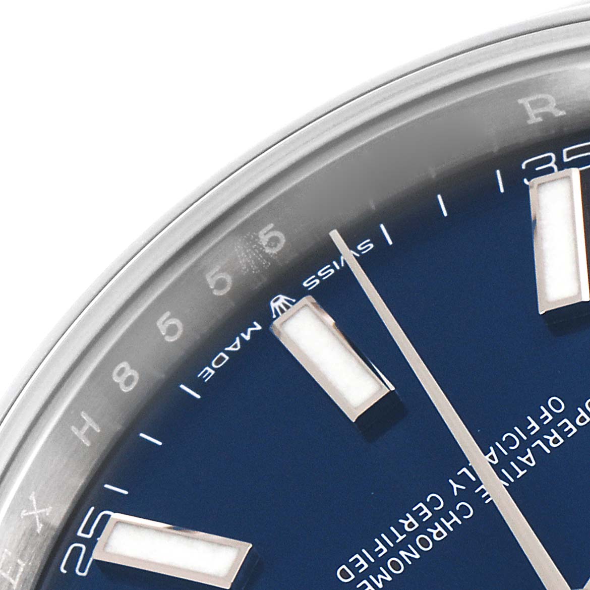 This close-up image of a Rolex Datejust 41 126300 Men's Stainless Steel Blue Dial 126300 Men's Stainless Steel Blue Dial watch shows a portion of the blue dial, hour markers, and part of the second hand.