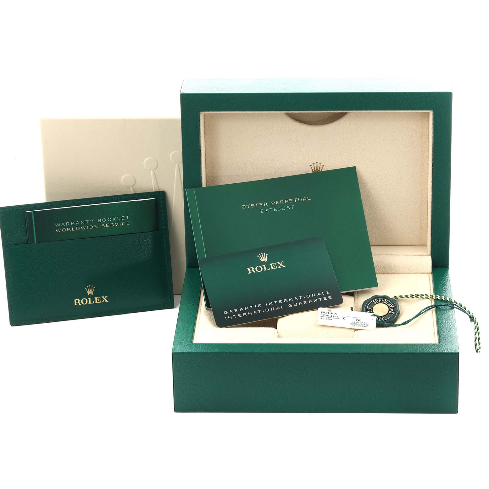 The image shows the packaging and accessories for a Rolex Datejust 41 126300 Men
s Stainless Steel Blue Dial 126300 Men
s Stainless Steel Blue Dial, including the box, booklets, and tag.